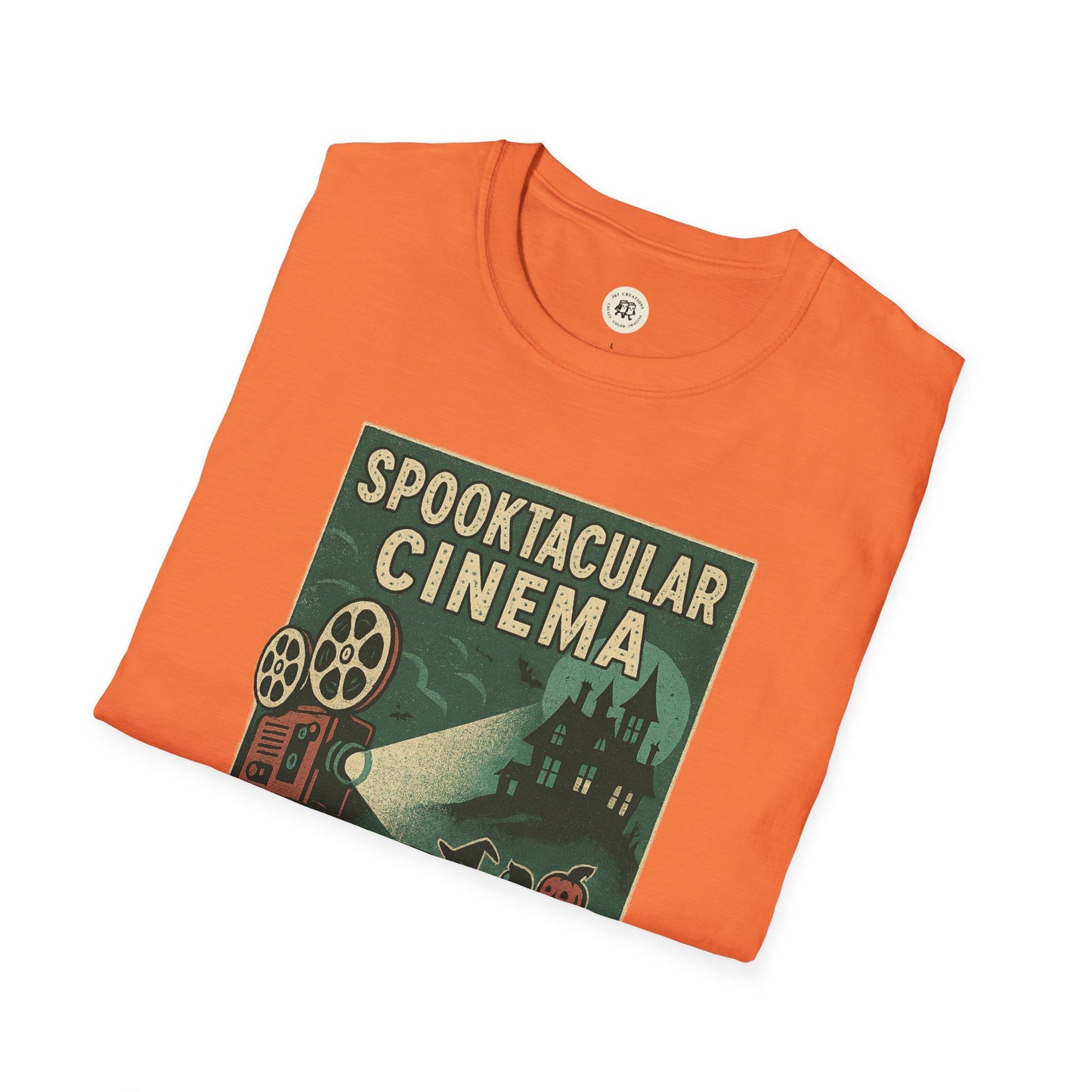 Orange Printify vintage cinema t-shirt with spooky movie projector and haunted house graphic