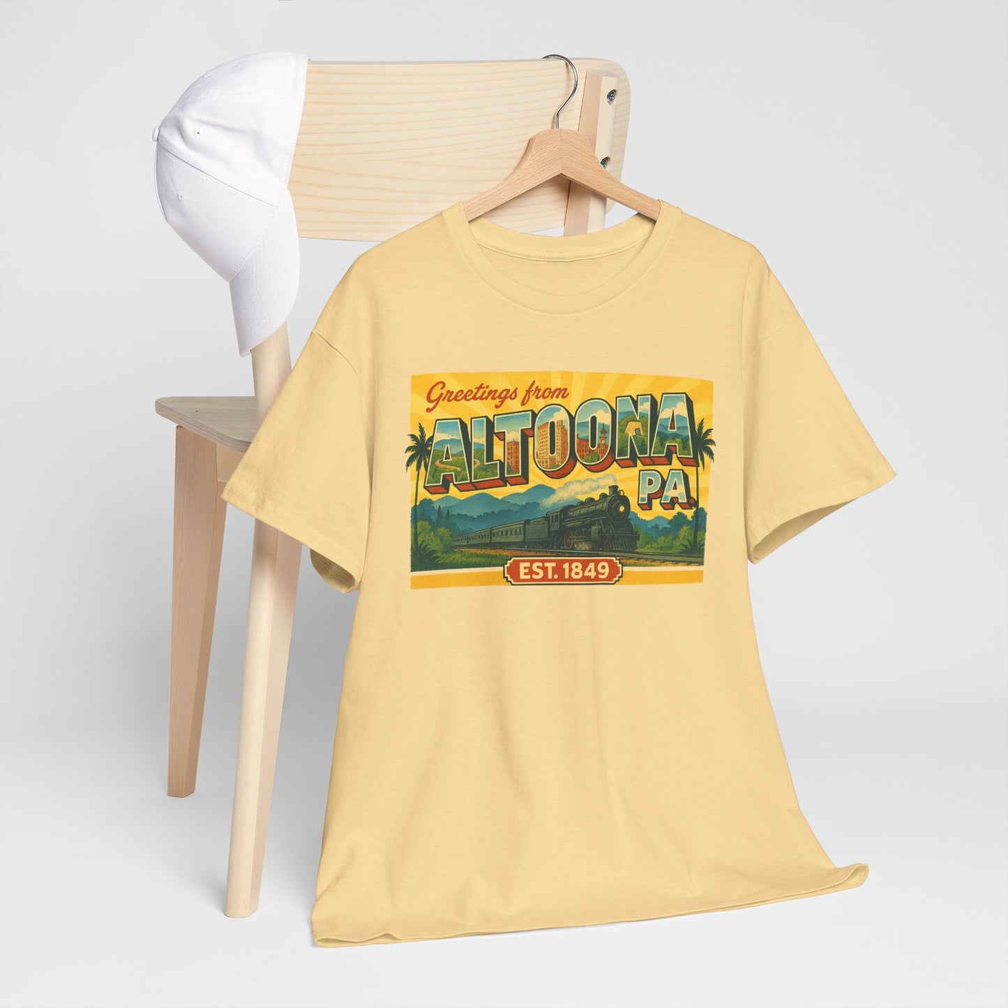 Printify yellow Altoona PA souvenir t-shirt with vintage Greetings from Altoona design