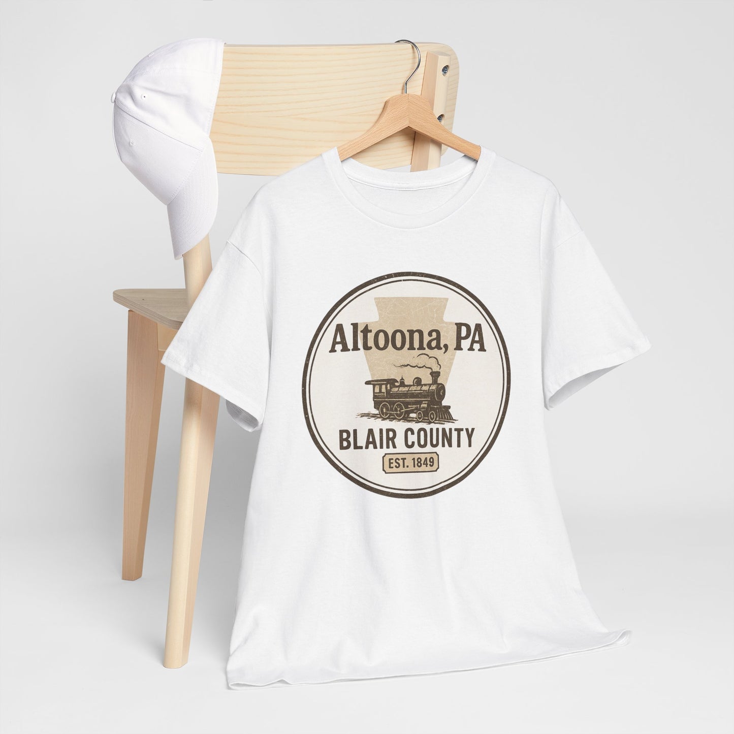 White Printify t-shirt featuring a vintage Altoona PA vintage t-shirt design with Blair County and train graphic