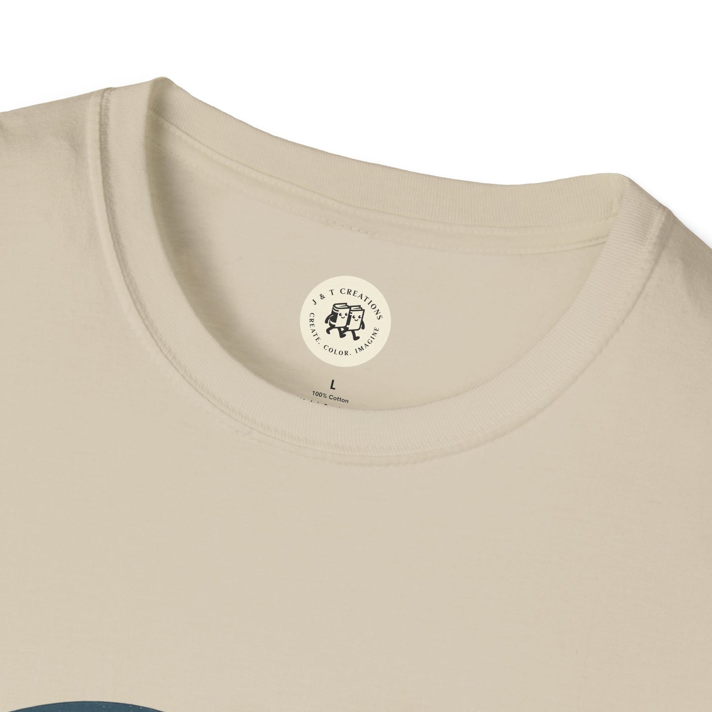 Close-up of Printify beige Fourth of July America t-shirt collar with tag and stitching details