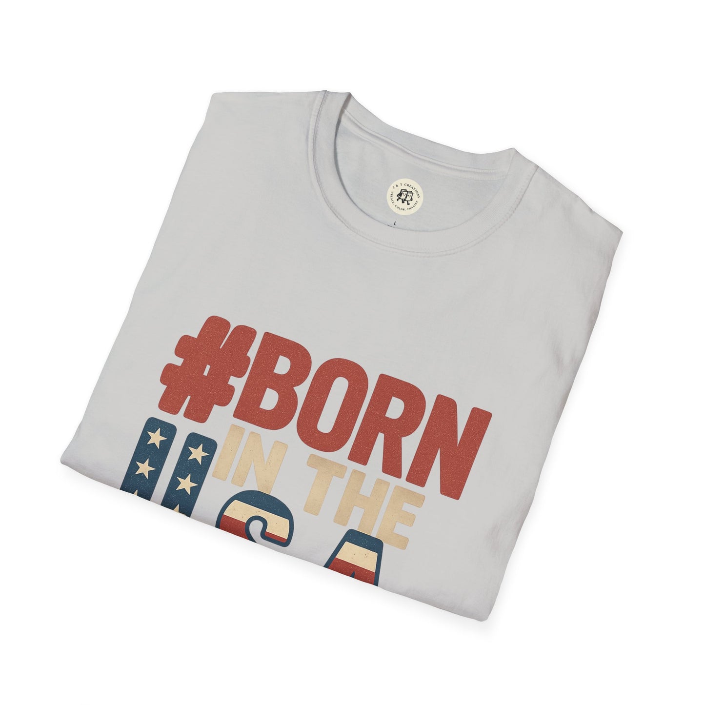 White folded Born in the USA t-shirt with patriotic red blue and beige print from Printify