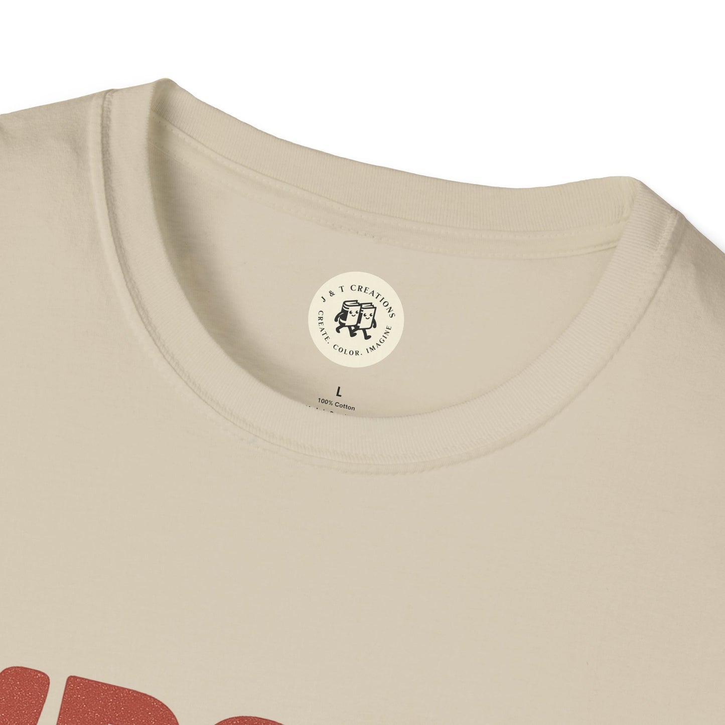 Close-up of beige Born in the USA t-shirt collar showing Printify label and tag