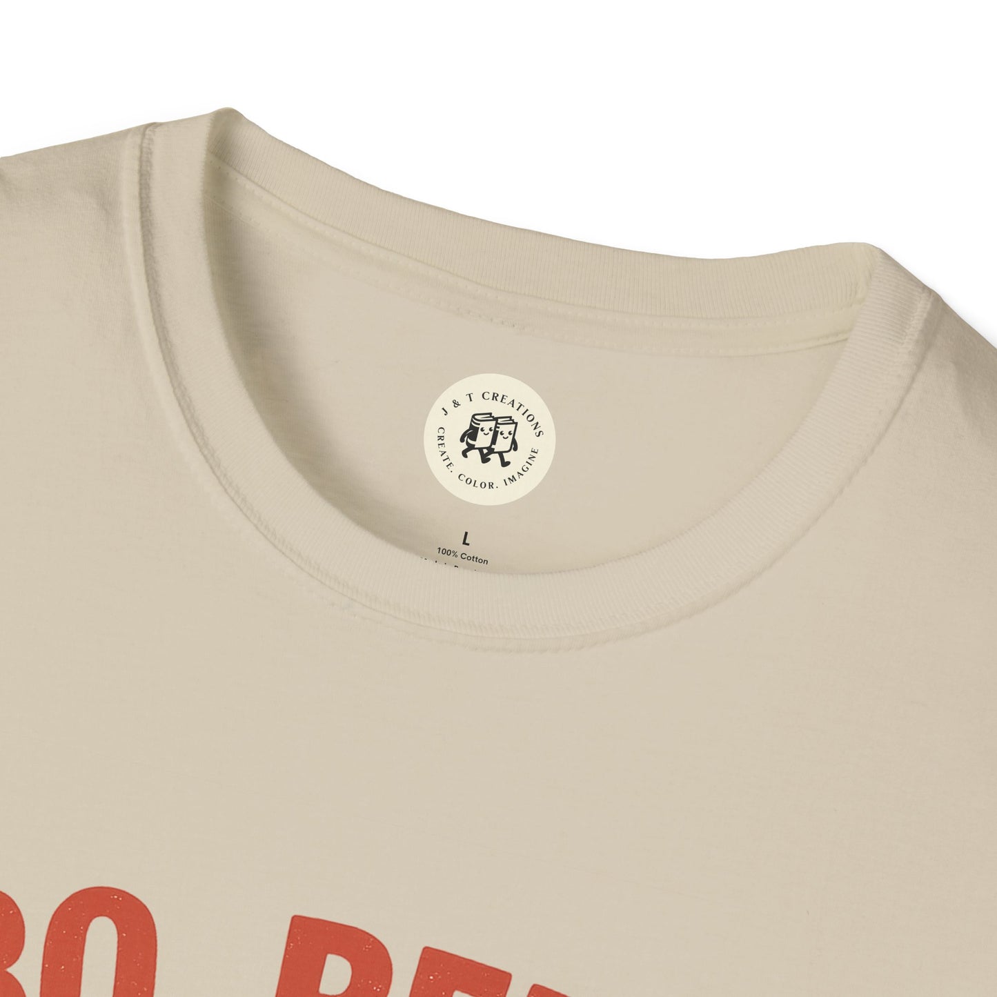 Close-up of Printify cream-colored BBQ beers American dream shirt collar and partial red text