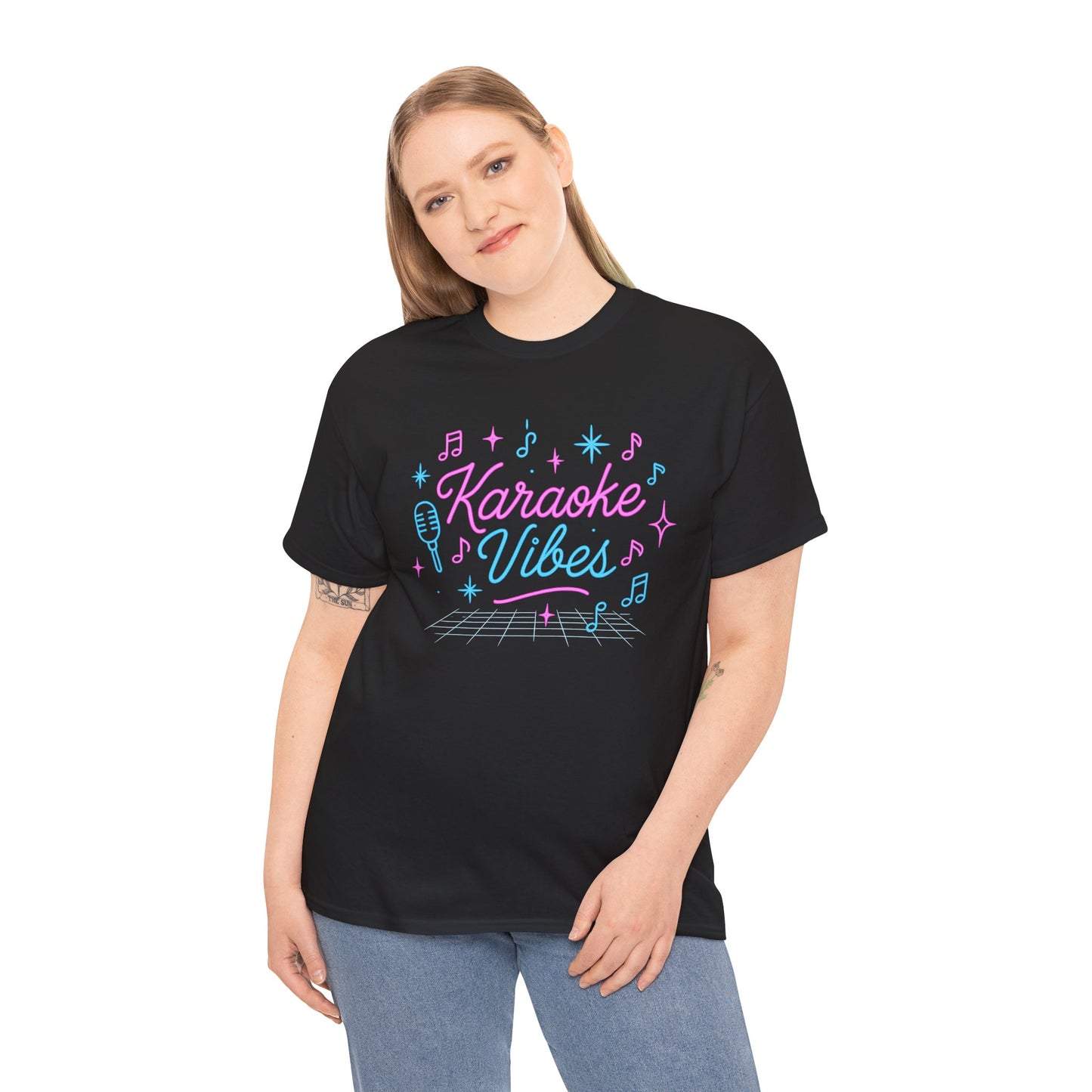 Black Printify karaoke vibes t-shirt with colorful musical notes worn by a woman
