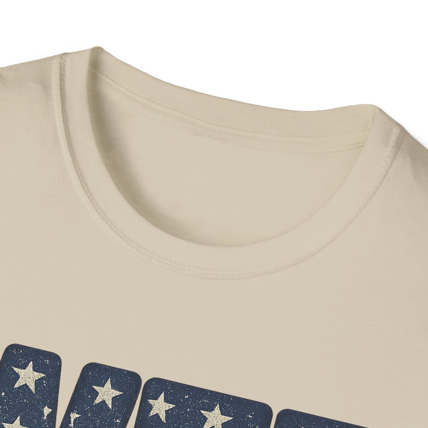Close-up of cream whiskey tango foxtrot shirt with navy star design on cotton fabric