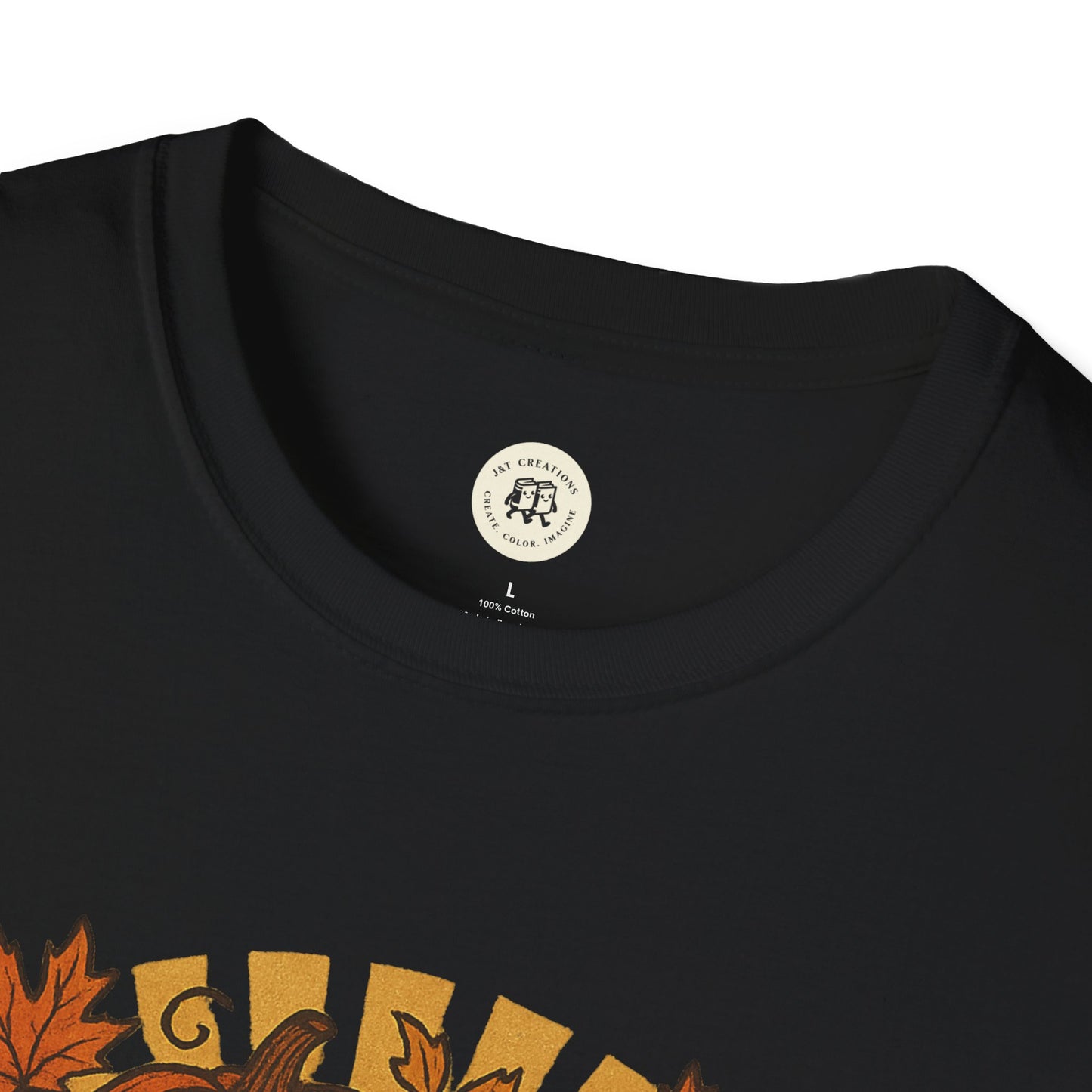 Black Printify T-Shirt featuring a happy halloween t-shirt design with autumn leaves and pumpkins