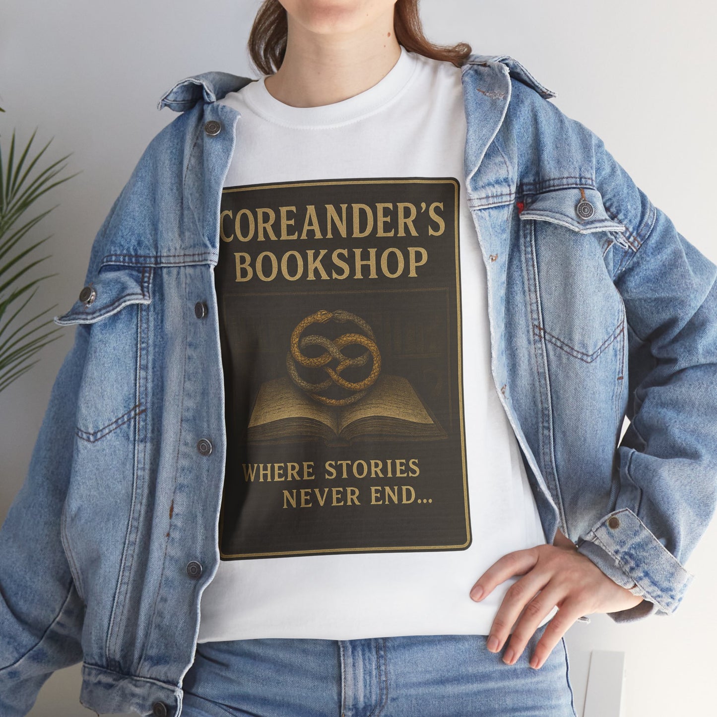 Neverending Story t-shirt with Coreander's Bookshop vintage design worn under denim jacket