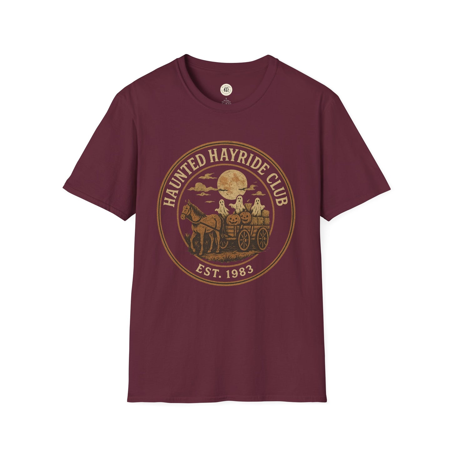 Maroon Printify haunted hayride t-shirt featuring a spooky design with ghosts and pumpkins on a horse-drawn wagon