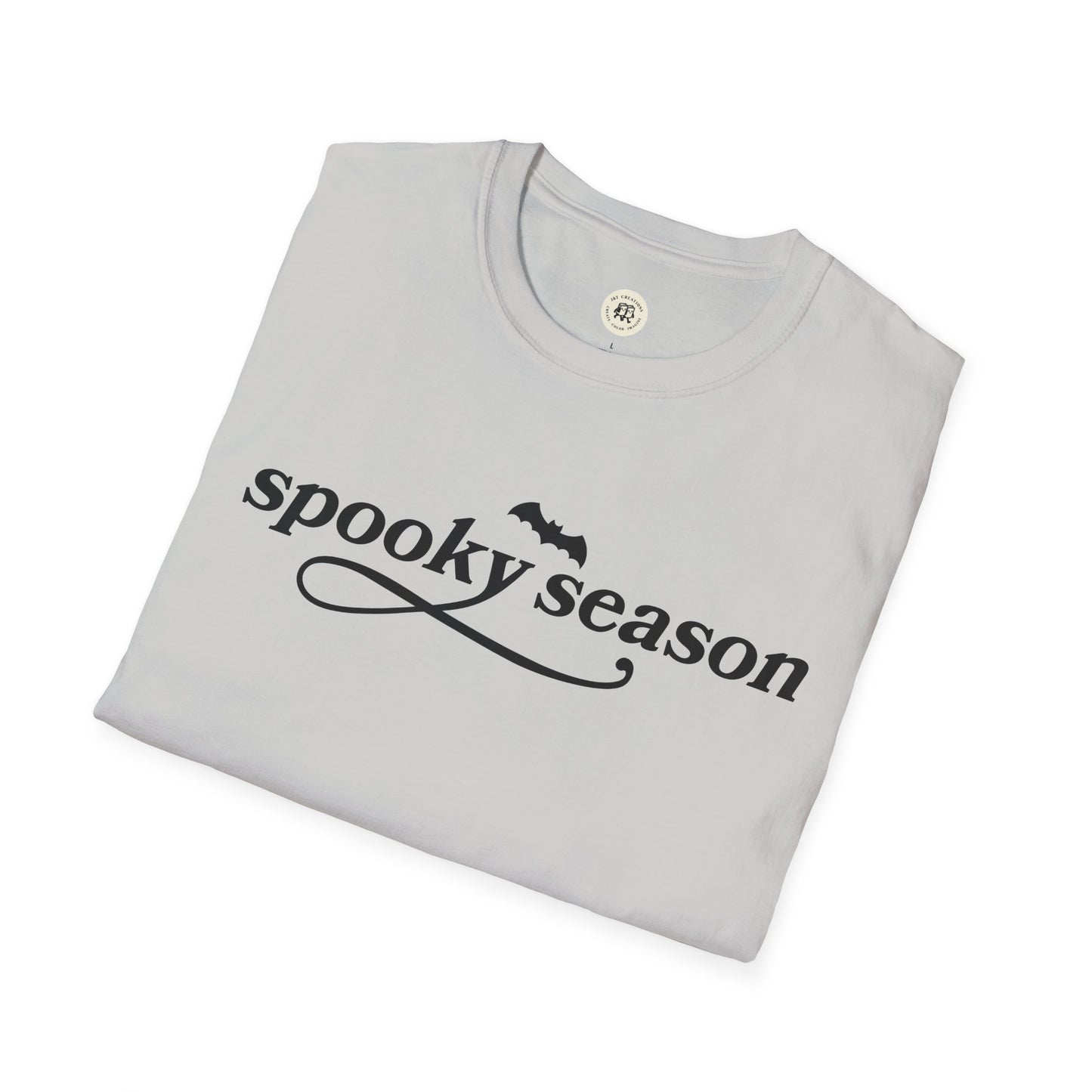 Folded Printify eco-friendly Halloween t-shirt in light gray with spooky season text and bat graphic
