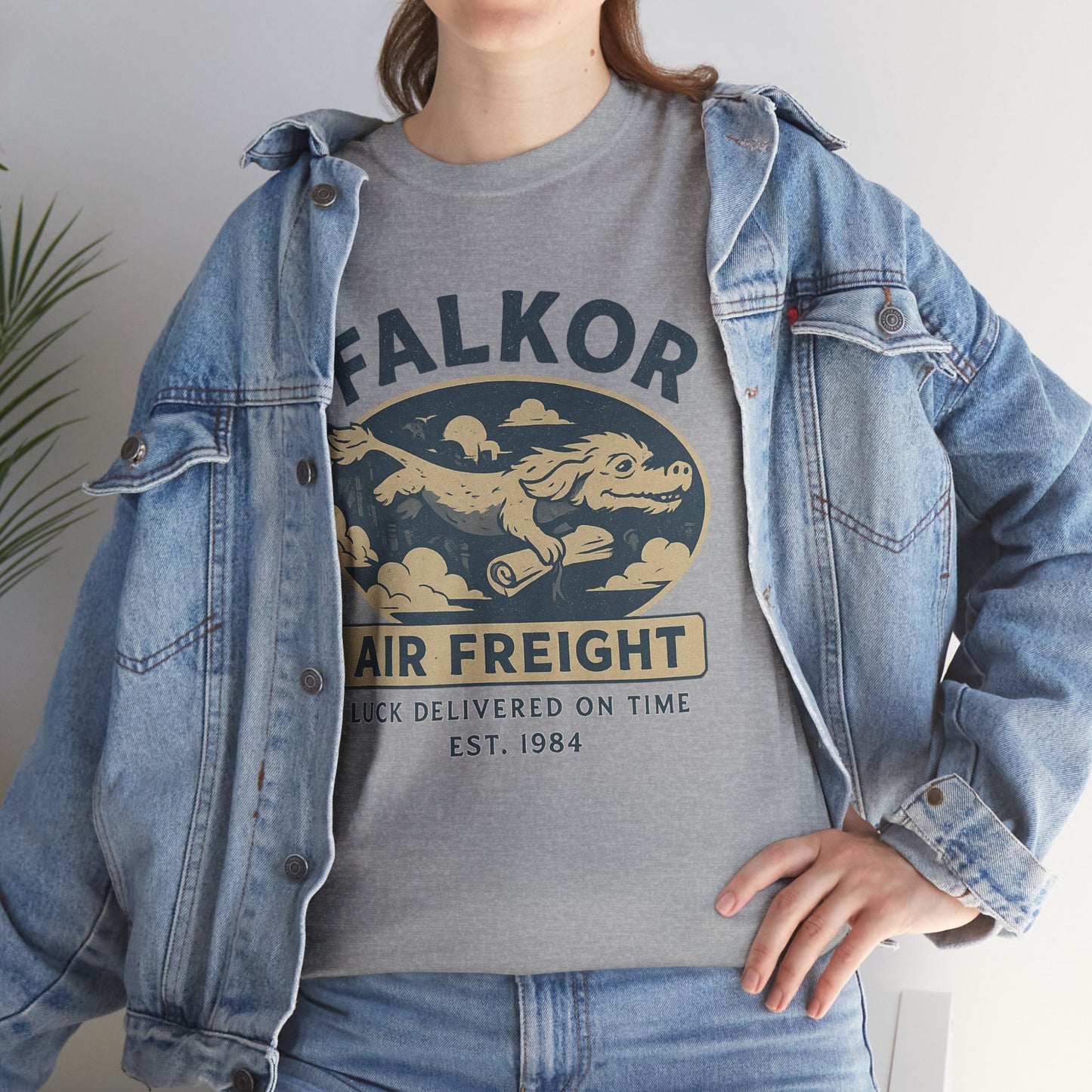 Falkor Neverending Story t-shirt printed gray crewneck worn with denim jacket and jeans