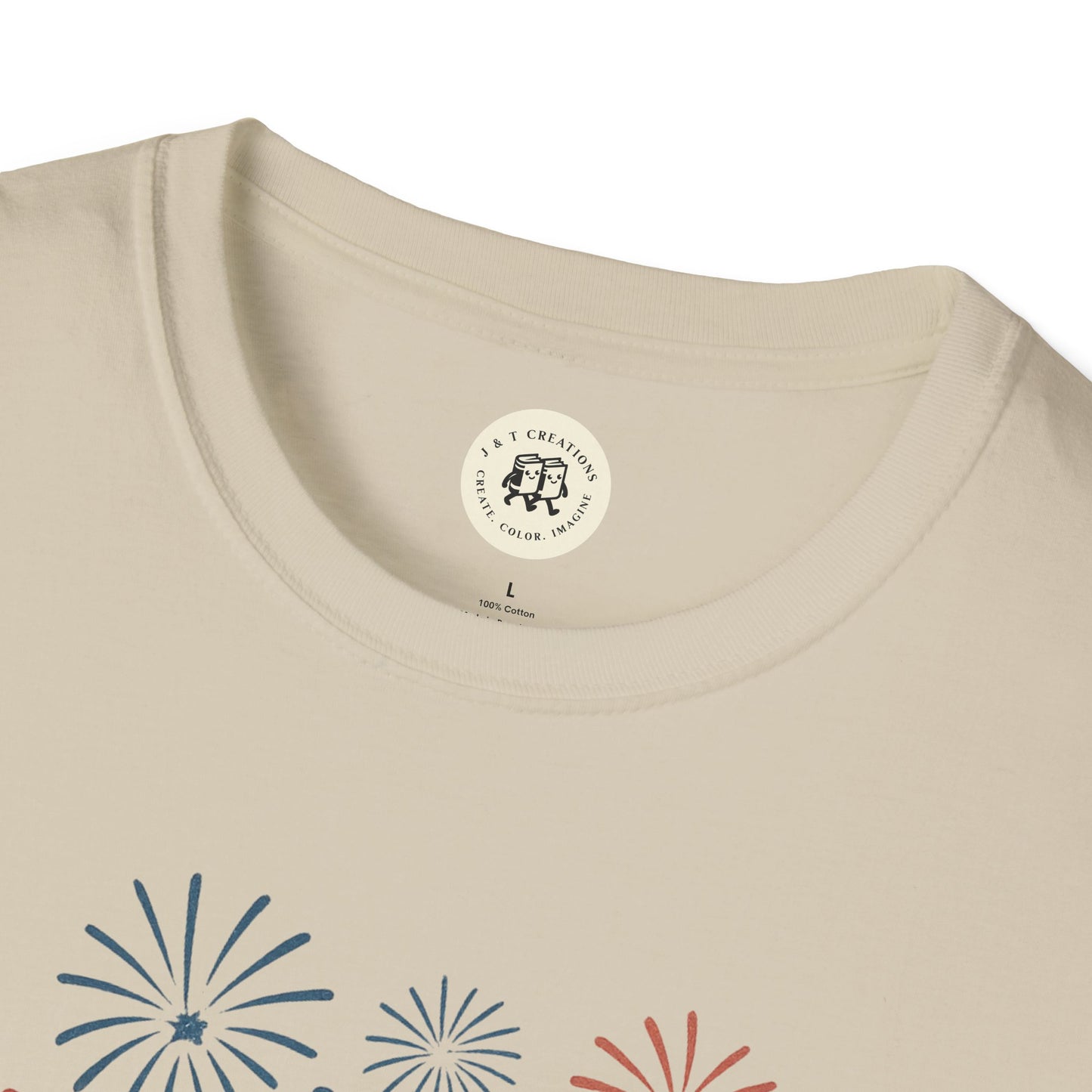 Printify beige T-shirt featuring a Fourth of July fireworks shirt design with colorful fireworks graphic