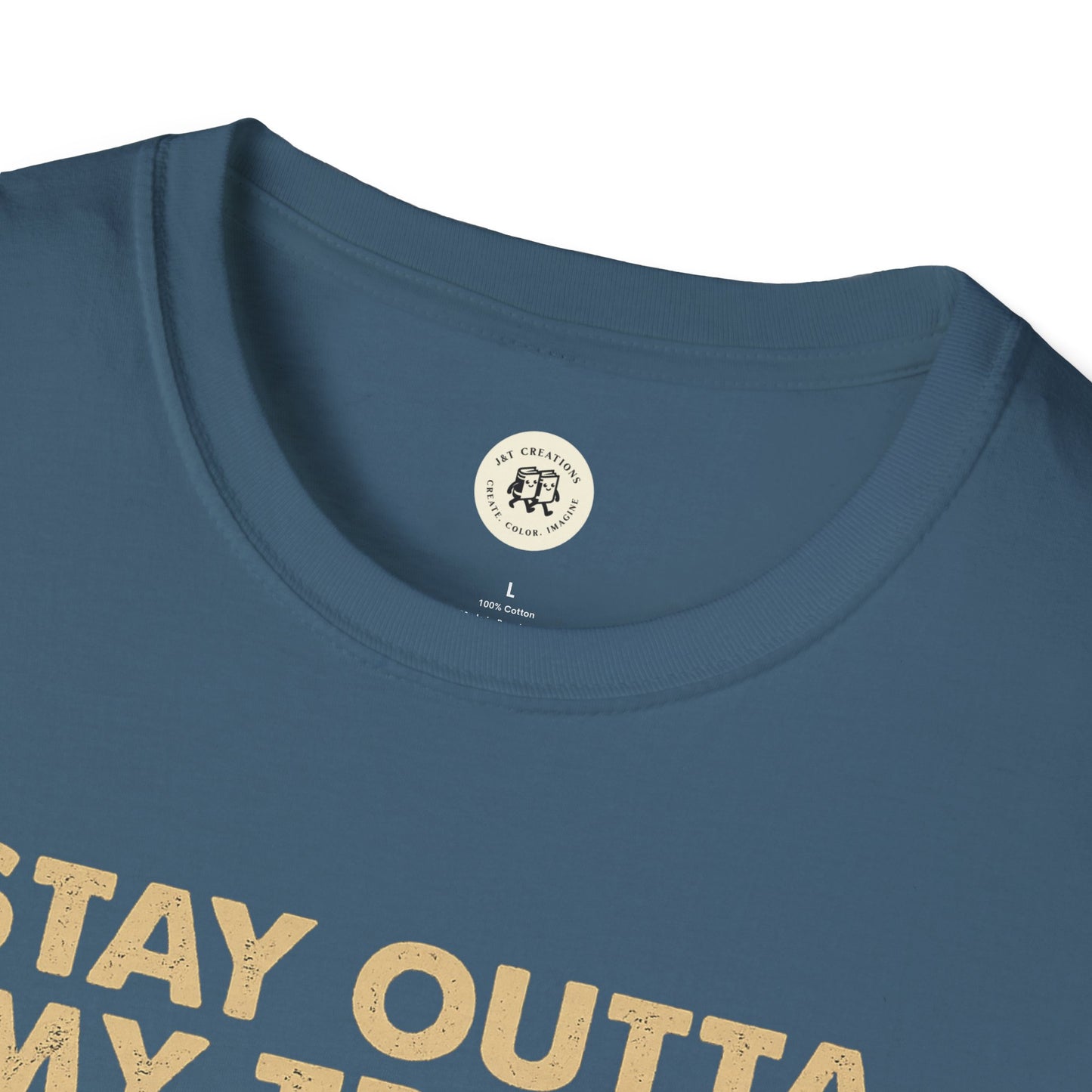 Close-up of a blue funny raccoon t-shirt with beige text printed on the front by Printify