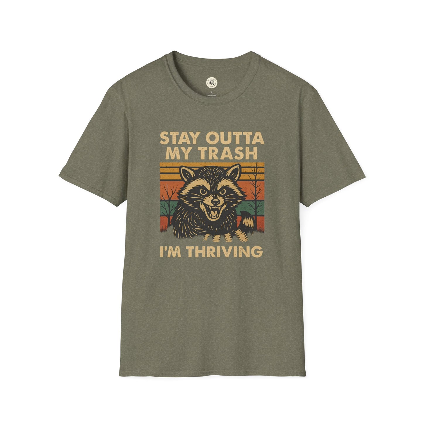 Funny raccoon t-shirt with Stay Outta My Trash I'm Thriving design on olive green Printify shirt