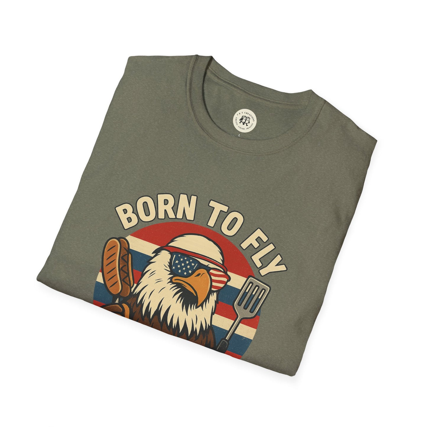 Printify funny summer BBQ shirts featuring a folded gray tee with eagle wearing American flag sunglasses holding spatula and sausage