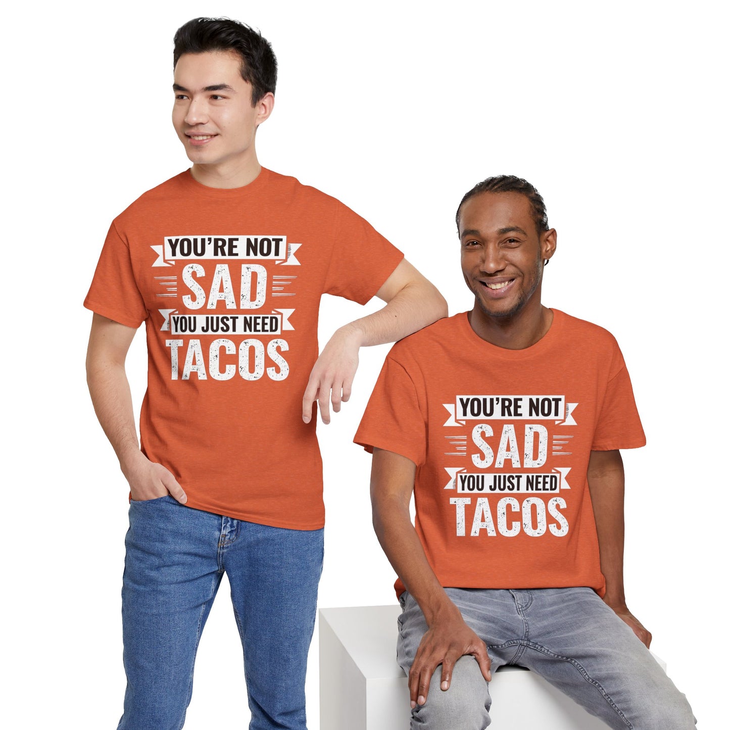 Funny taco t shirt with Youβre Not Sad You Just Need Tacos slogan worn by two men in orange tees