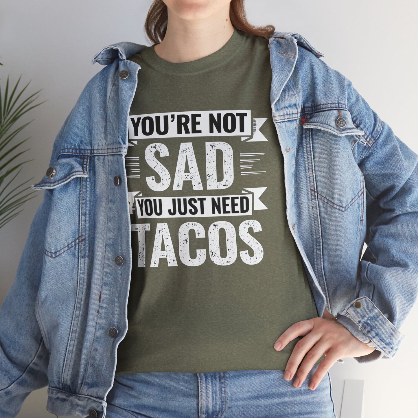 Printify funny taco t shirt in olive green with text Youβre not sad you just need tacos worn with denim jacket