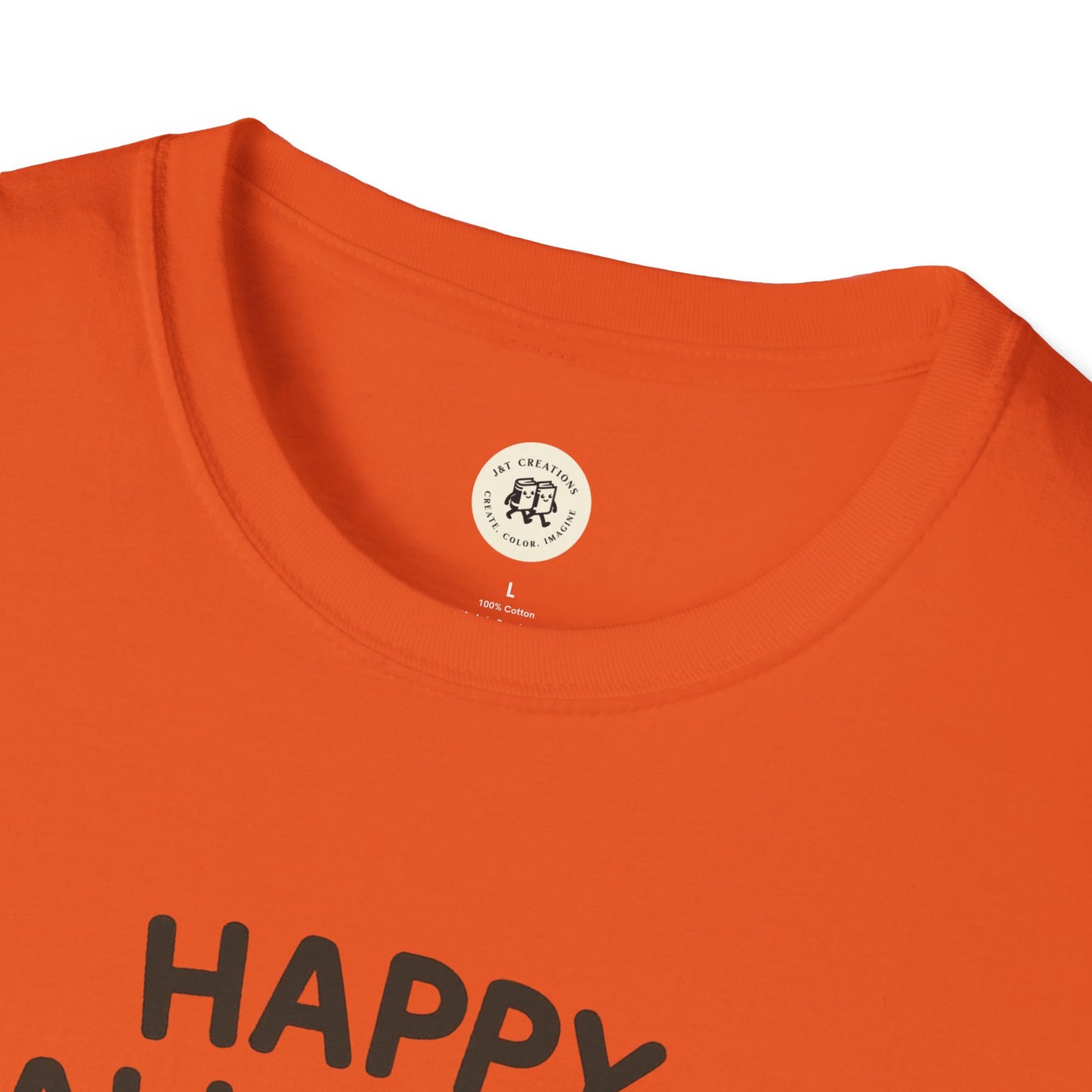 Close-up of orange Halloween pumpkin graphic tee collar and print on cotton fabric