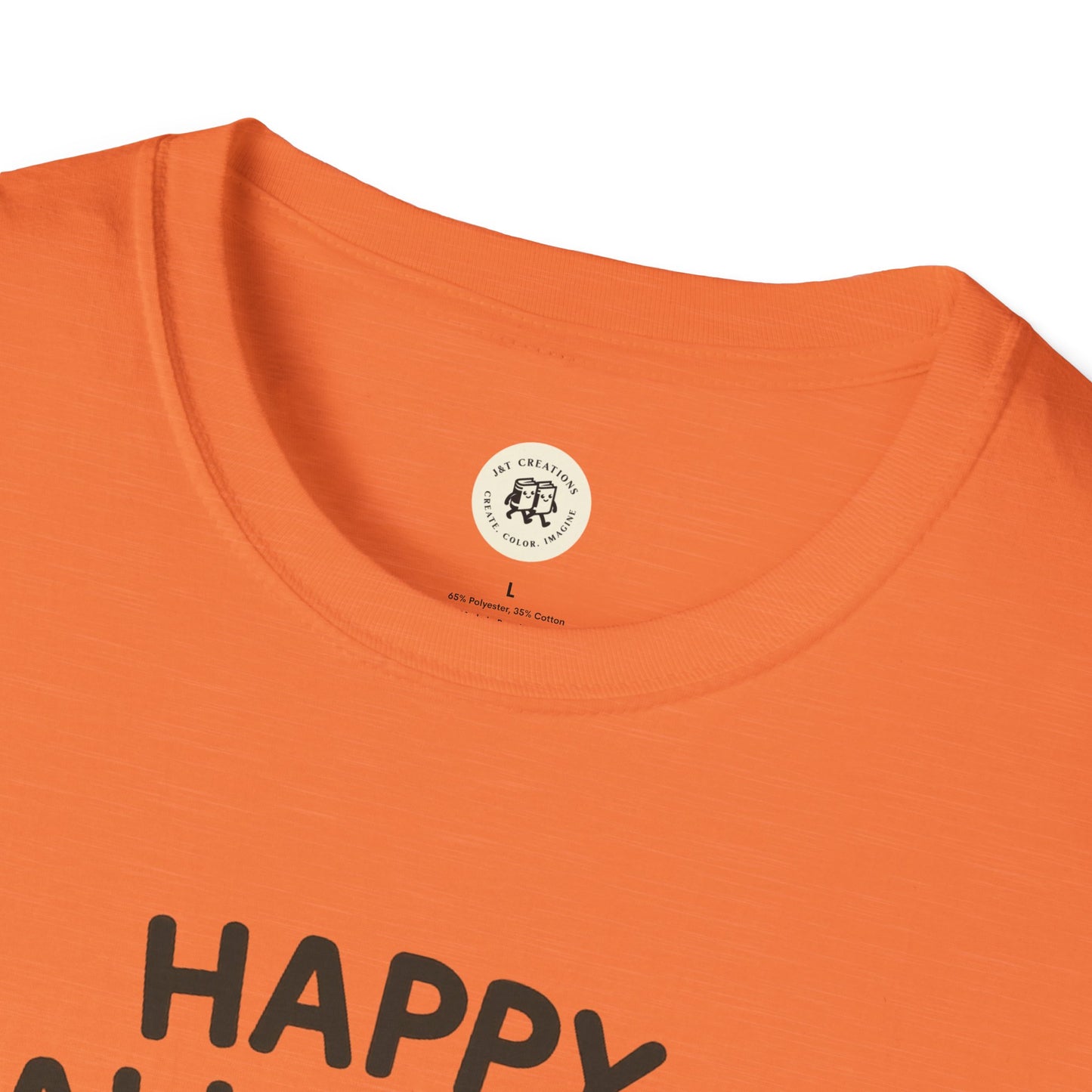 Orange Halloween pumpkin graphic tee by Printify with black happy text on front