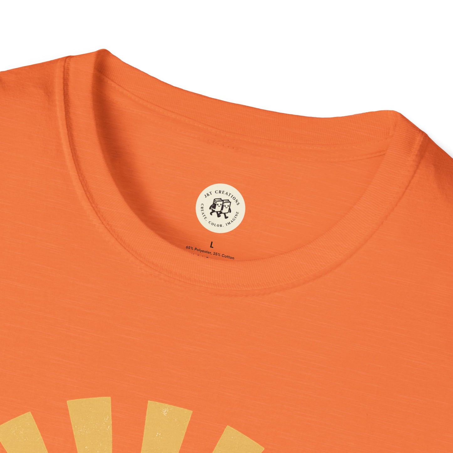 Close-up of orange Printify Happy Halloween t-shirt neckline and partial printed design