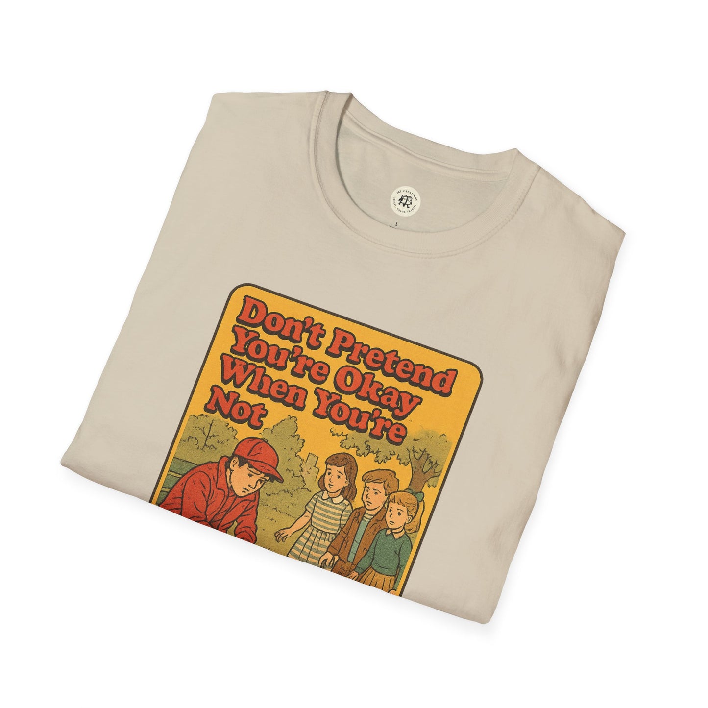 Folded beige Printify Holden Caulfield mental health t-shirt with vintage style graphic and text