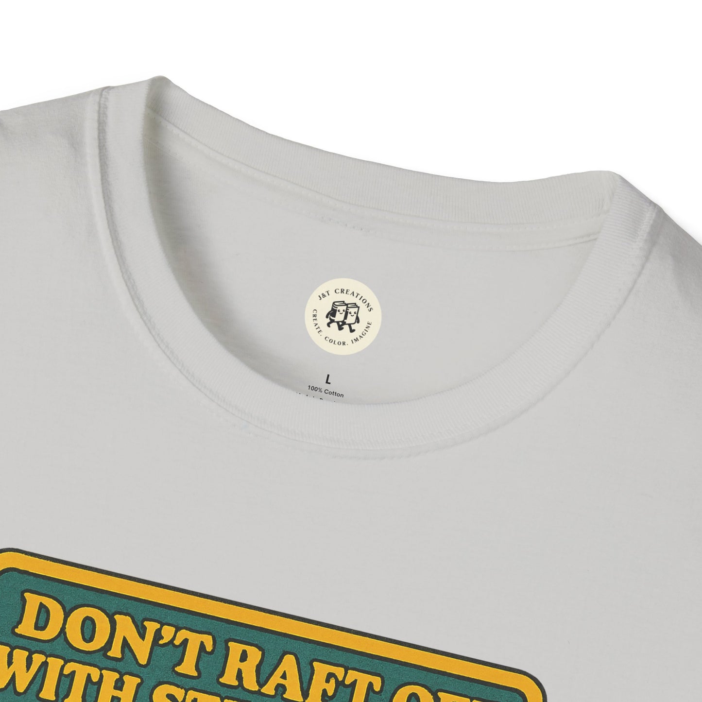 Close-up of Printify Huck Finn safety t-shirt collar and partial graphic on white fabric