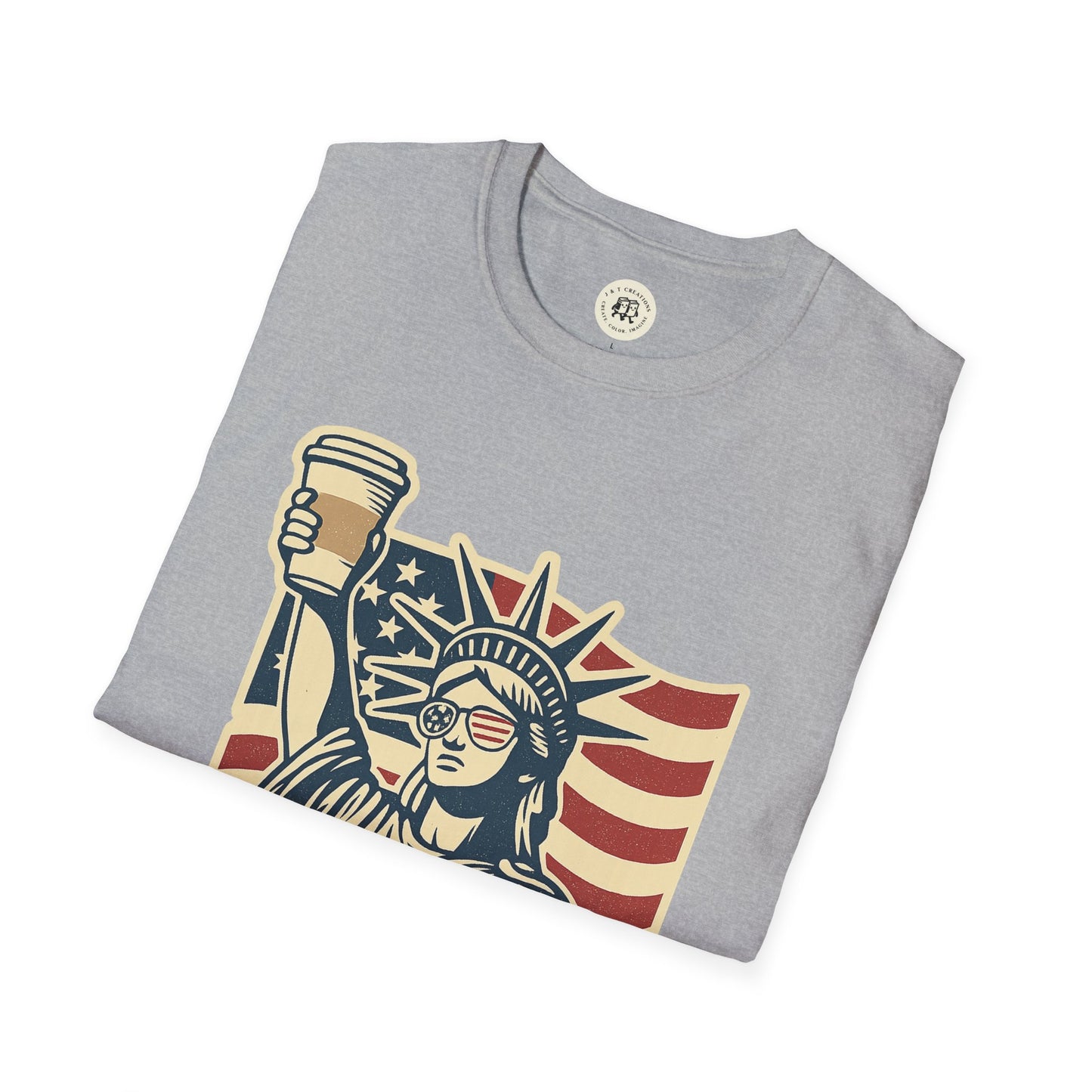 Printify gray T-Shirt featuring Statue of Liberty holding coffee cup with American flag background Independence Day coffee shirt