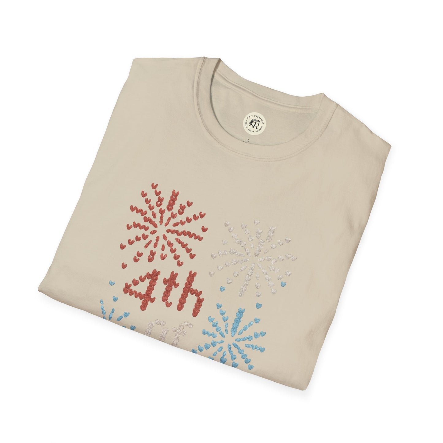 Printify beige 4th of July fireworks t-shirt with red white and blue firework heart designs