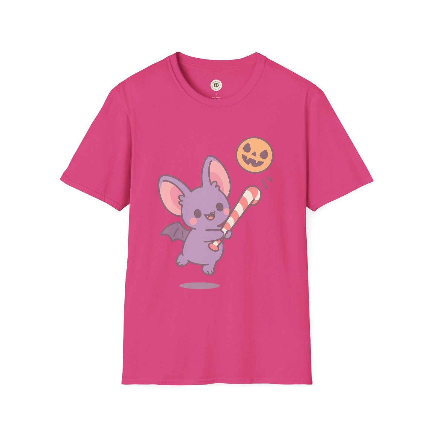 Printify pink t-shirt featuring a cute Halloween bat t-shirt design with a playful bat holding a striped candy