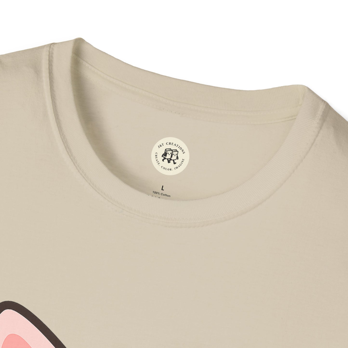 Close-up of Printify beige kawaii cat t-shirt neckline and partial cat ear design