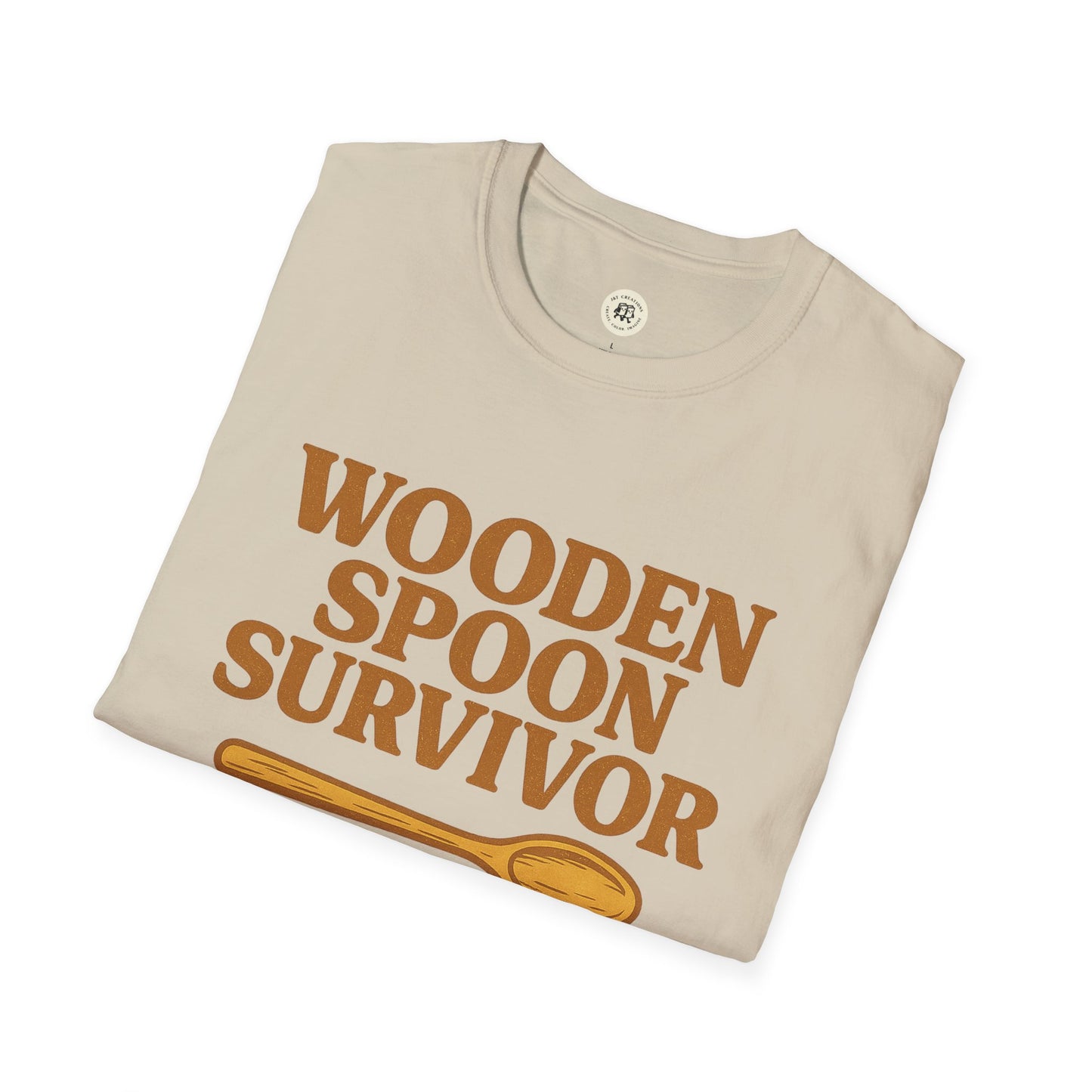 Printify beige wooden spoon survivor t-shirt with brown text and wooden spoon graphic1