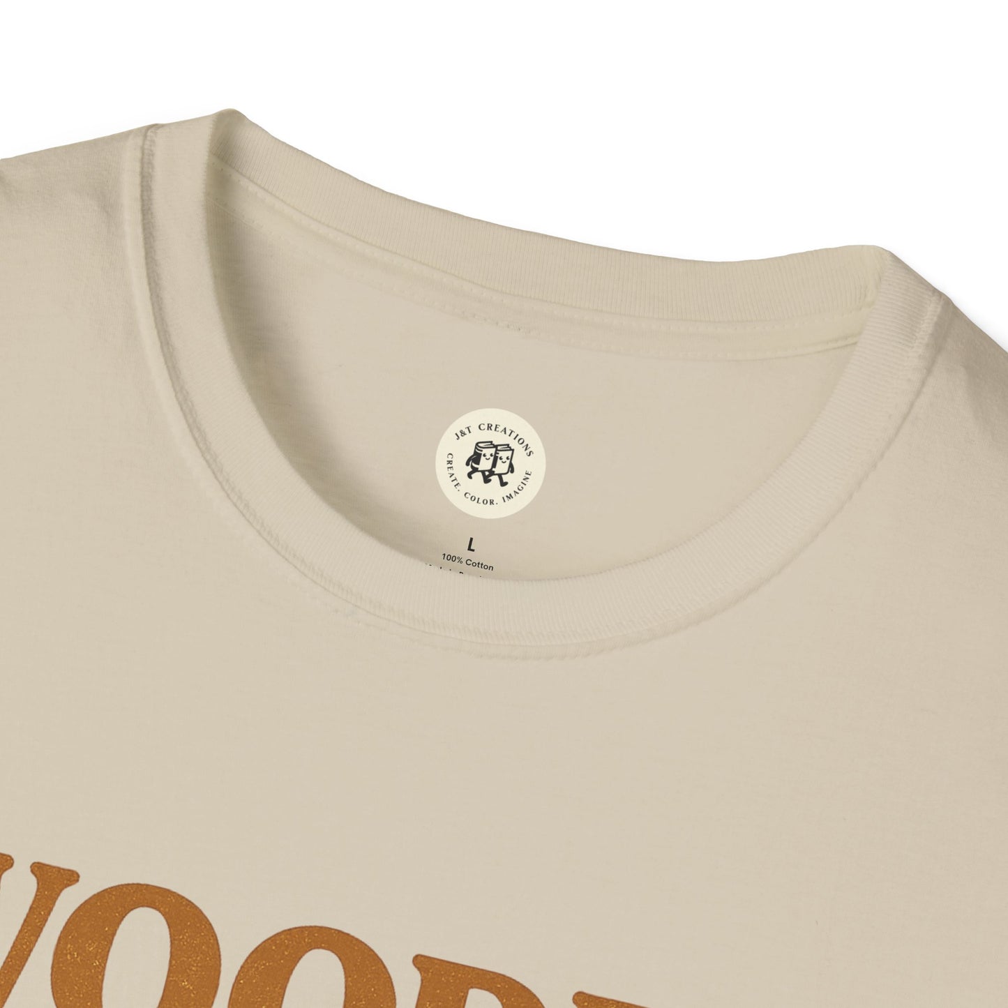 Close-up of Printify wooden spoon survivor t-shirt neckline and fabric texture in beige color