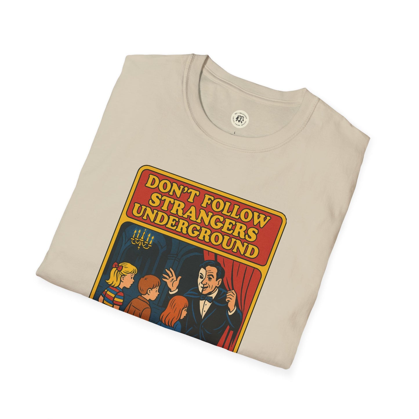 Beige phantom of the opera t-shirt with vintage style graphic and warning text about strangers underground