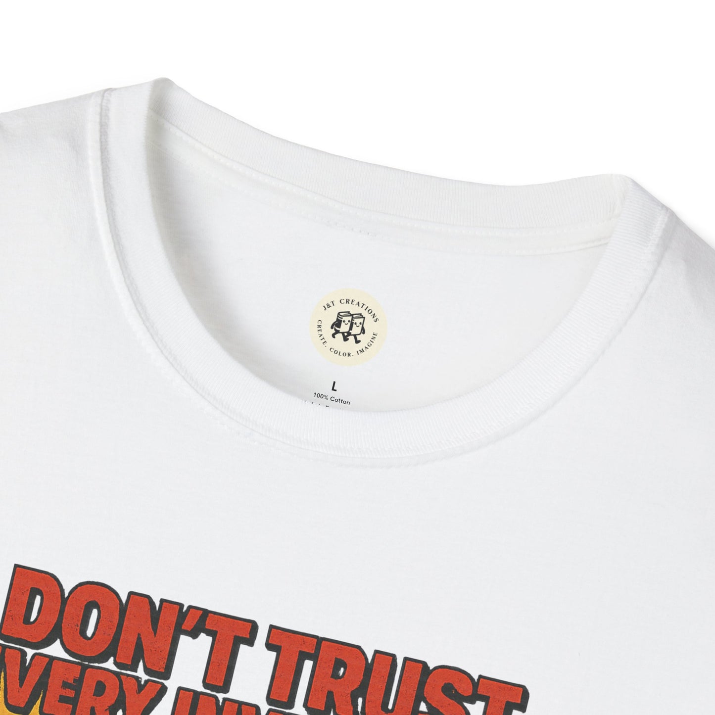 Close-up of white vintage odysseus graphic tee by Printify featuring bold red and orange text print