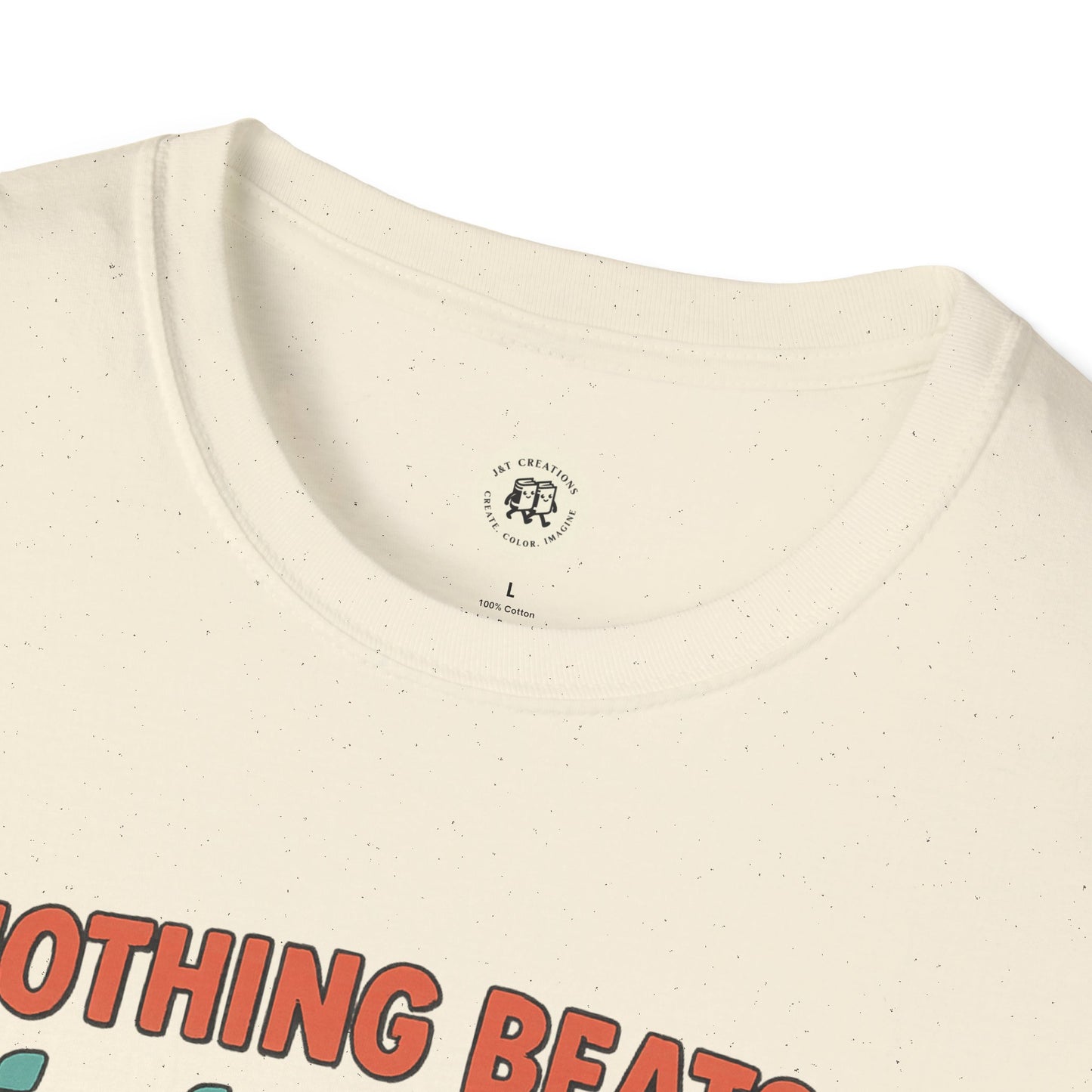 Close-up of Printify jet2 holiday t-shirt cream fabric with speckled texture and printed text design