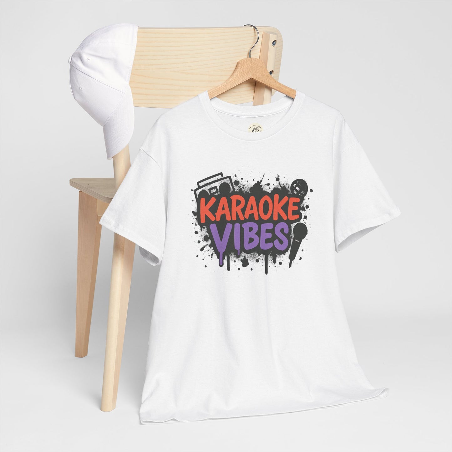 White Printify karaoke t-shirt for parties with colorful karaoke vibes design displayed on hanger