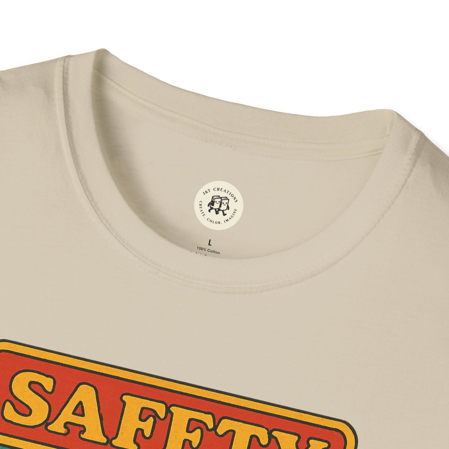 Close-up of Printify Korn safety shirt beige t-shirt with safety graphic print and crew neckline