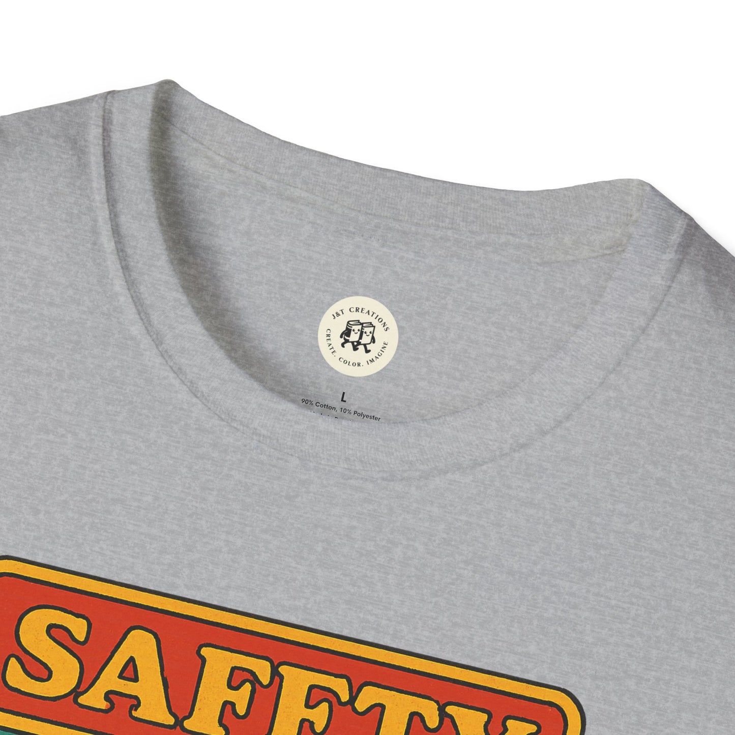 Close-up of gray Korn safety shirt by Printify with round neckline and bold orange text
