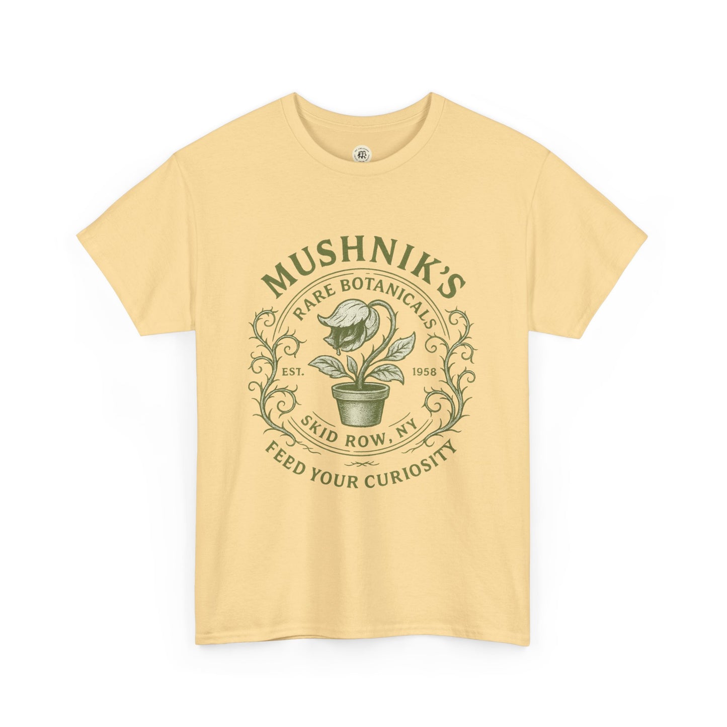 Printify Little Shop of Horrors t-shirt in pale yellow featuring Mushnik's Rare Botanicals plant design