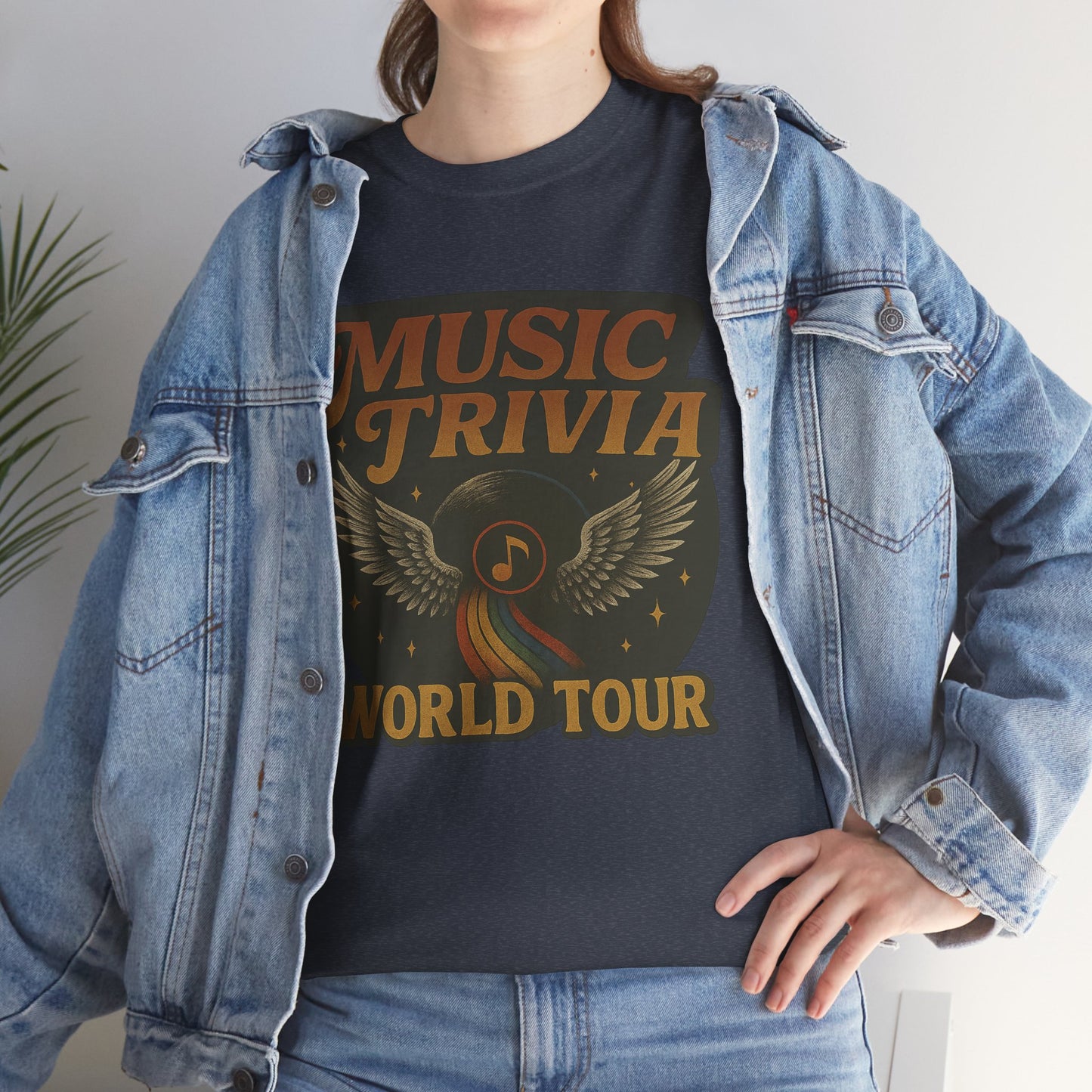 Black music trivia t-shirt with vintage wings and world tour graphic worn with denim jacket