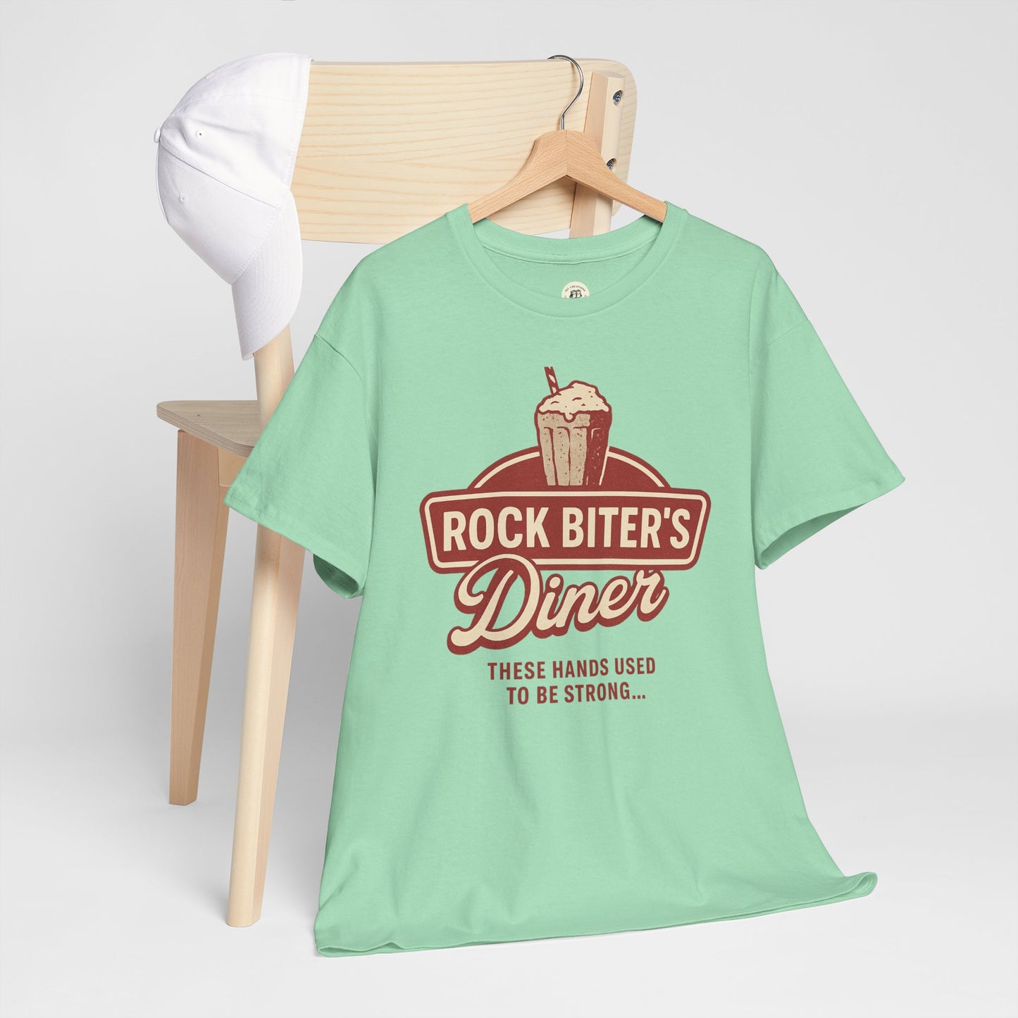Mint green Neverending Story diner t-shirt with Rock Biter's Diner graphic and vintage milkshake design