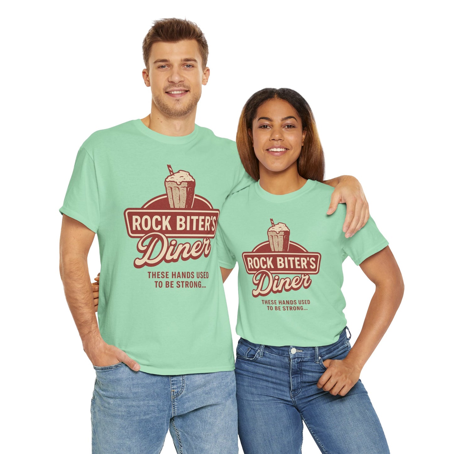 Couple wearing mint green neverending story diner t-shirt with retro milkshake graphic and text