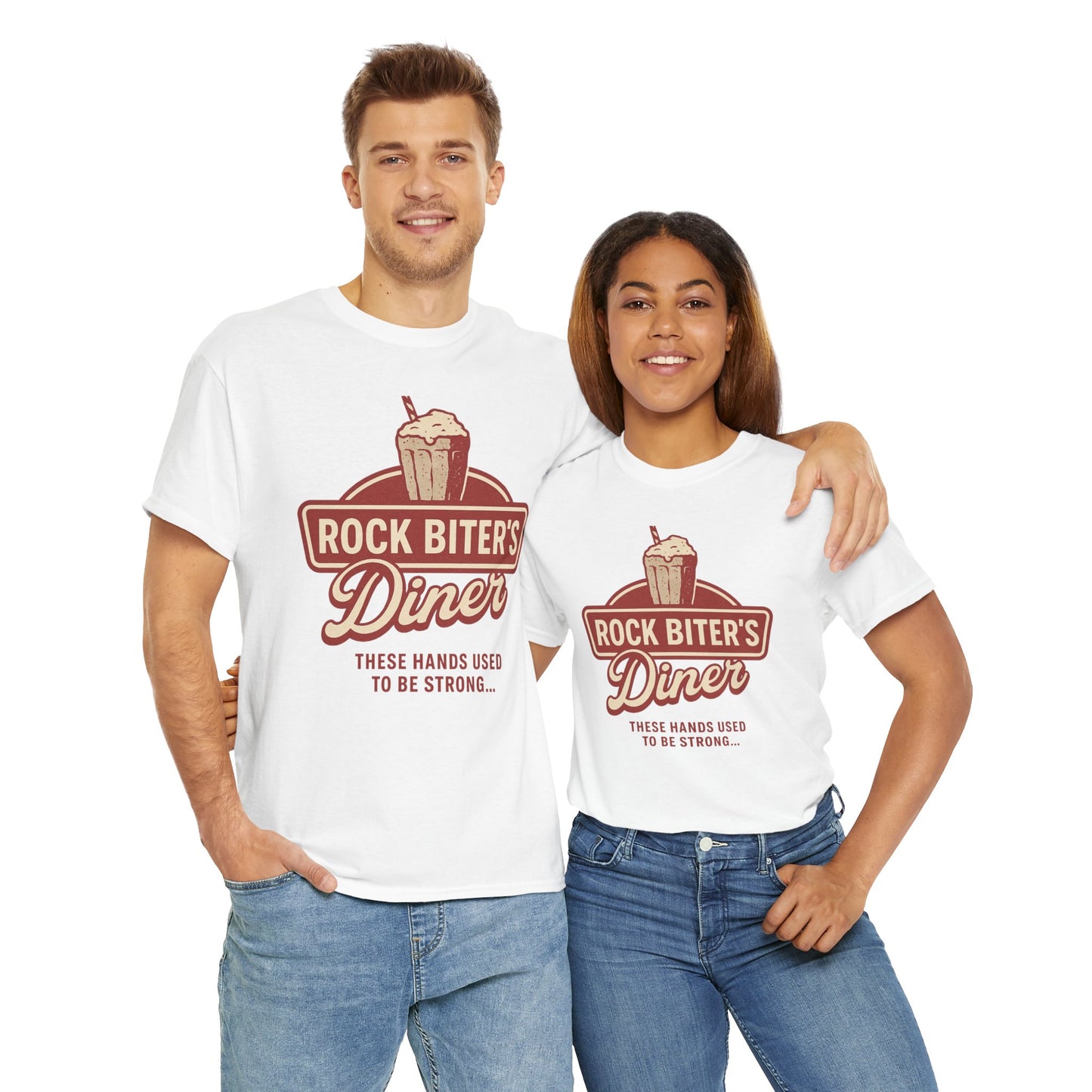 Couple wearing white Printify Neverending Story diner t-shirt with Rock Biter's Diner graphic and slogan