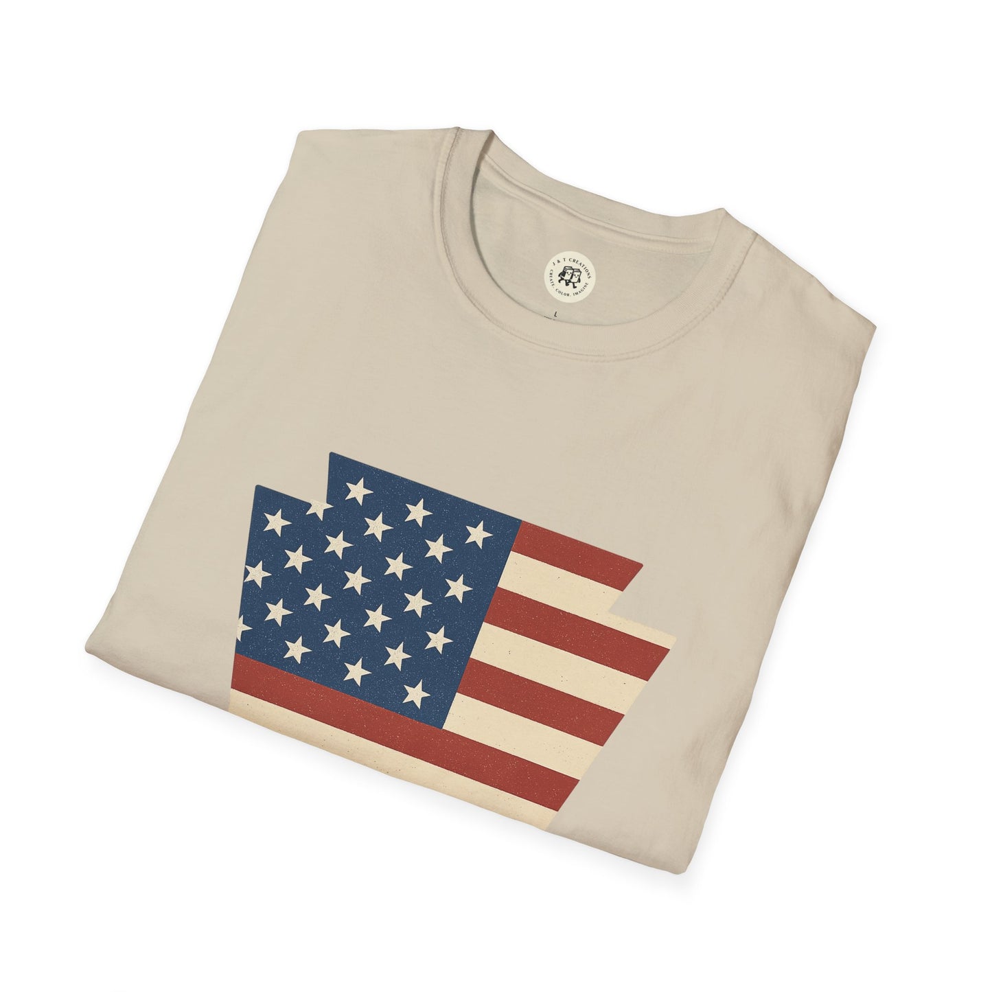 Beige Printify T-shirt featuring a Pennsylvania Keystone American flag shirt design with stars and stripes