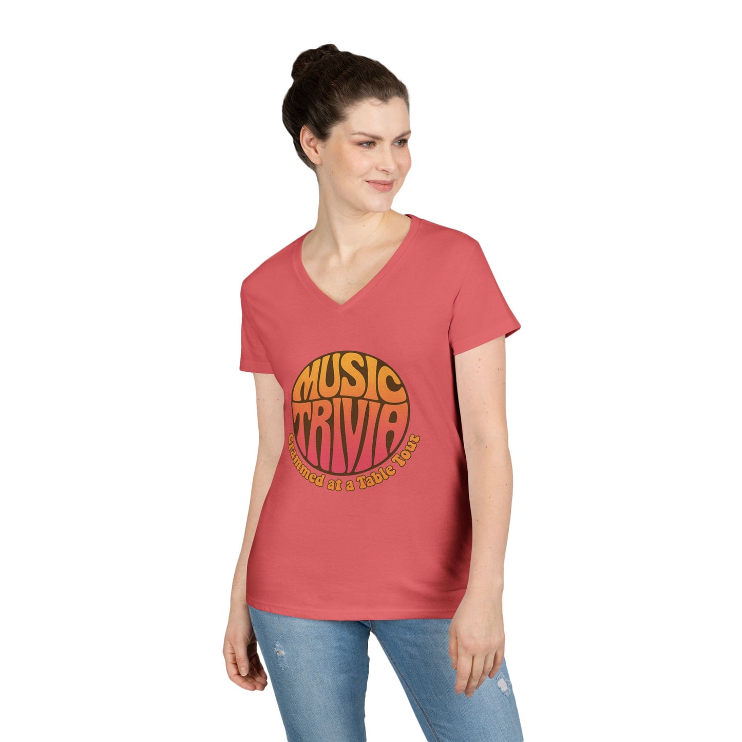 Woman wearing a coral red Printify V-neck retro music trivia t-shirt with vintage style graphic