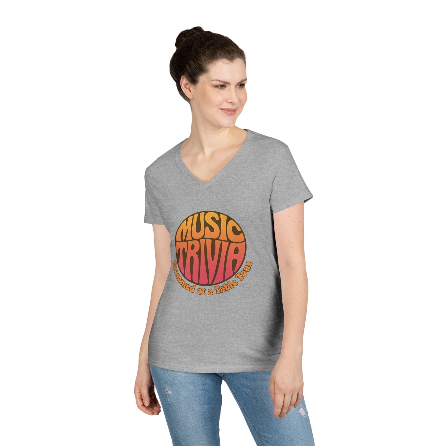 Printify gray V-neck retro music trivia t-shirt worn by woman with orange and red music trivia graphic