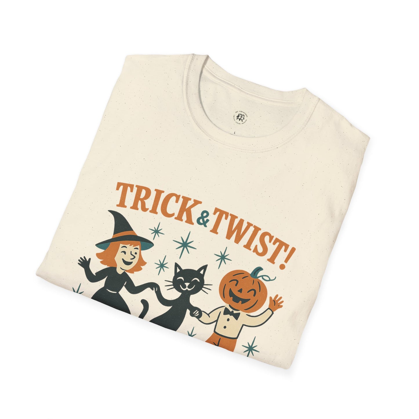 Printify cream Halloween graphic t-shirt folded with retro Trick and Twist design featuring witch black cat and pumpkin