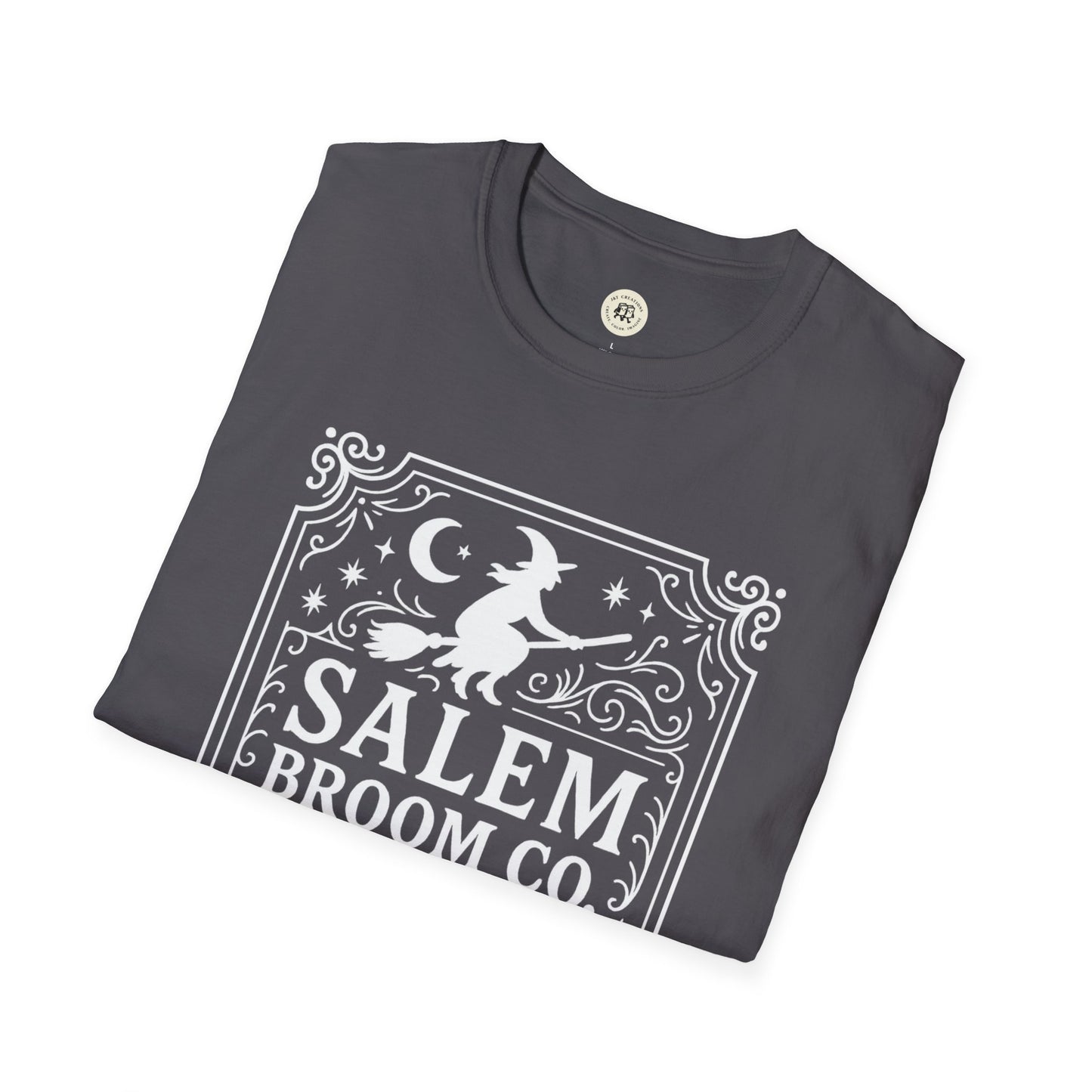 Folded black Salem Broom Co. t-shirt with a white witch and moon design by Printify