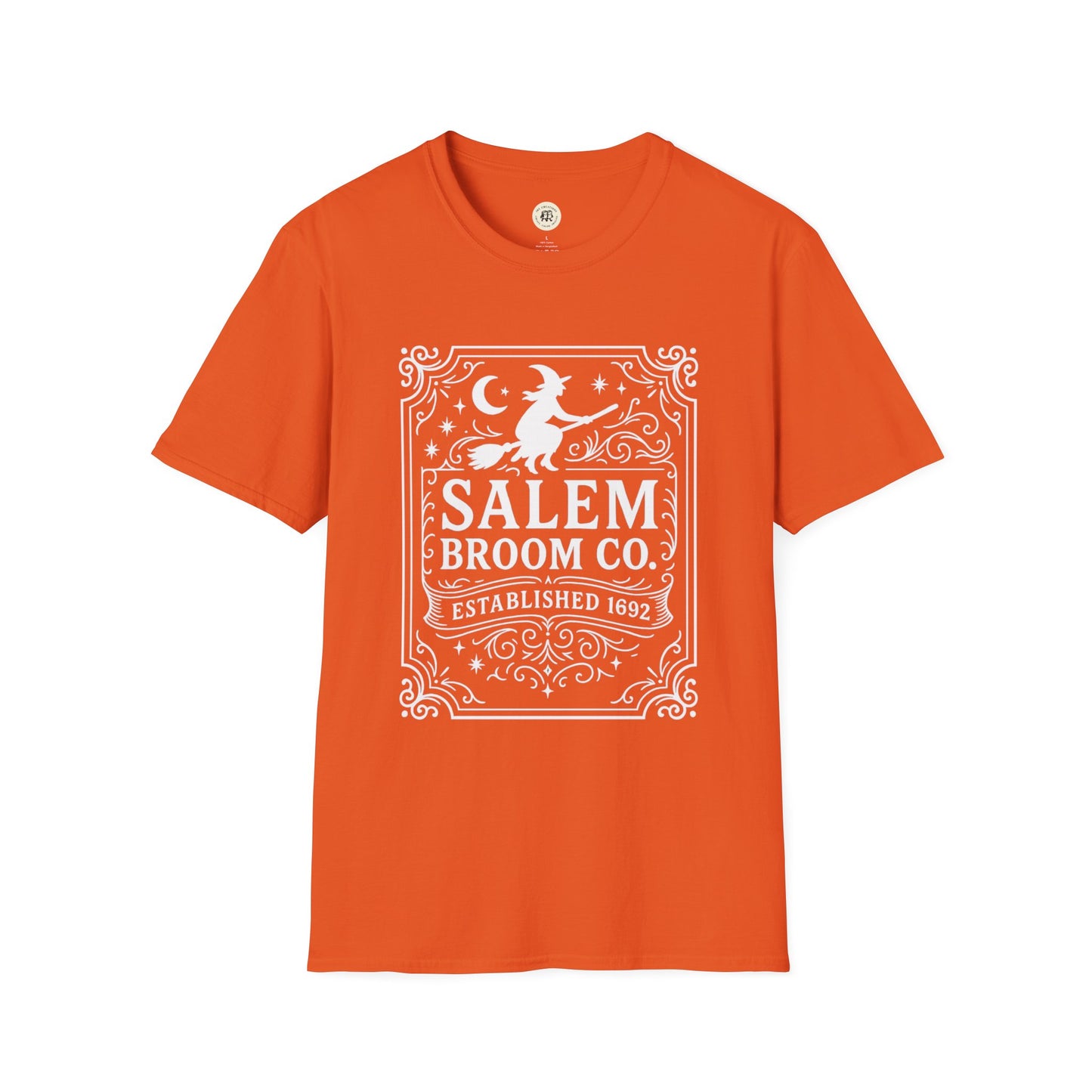 Orange Printify t-shirt featuring Salem Broom Co. t-shirt design with witch on broom and vintage frame