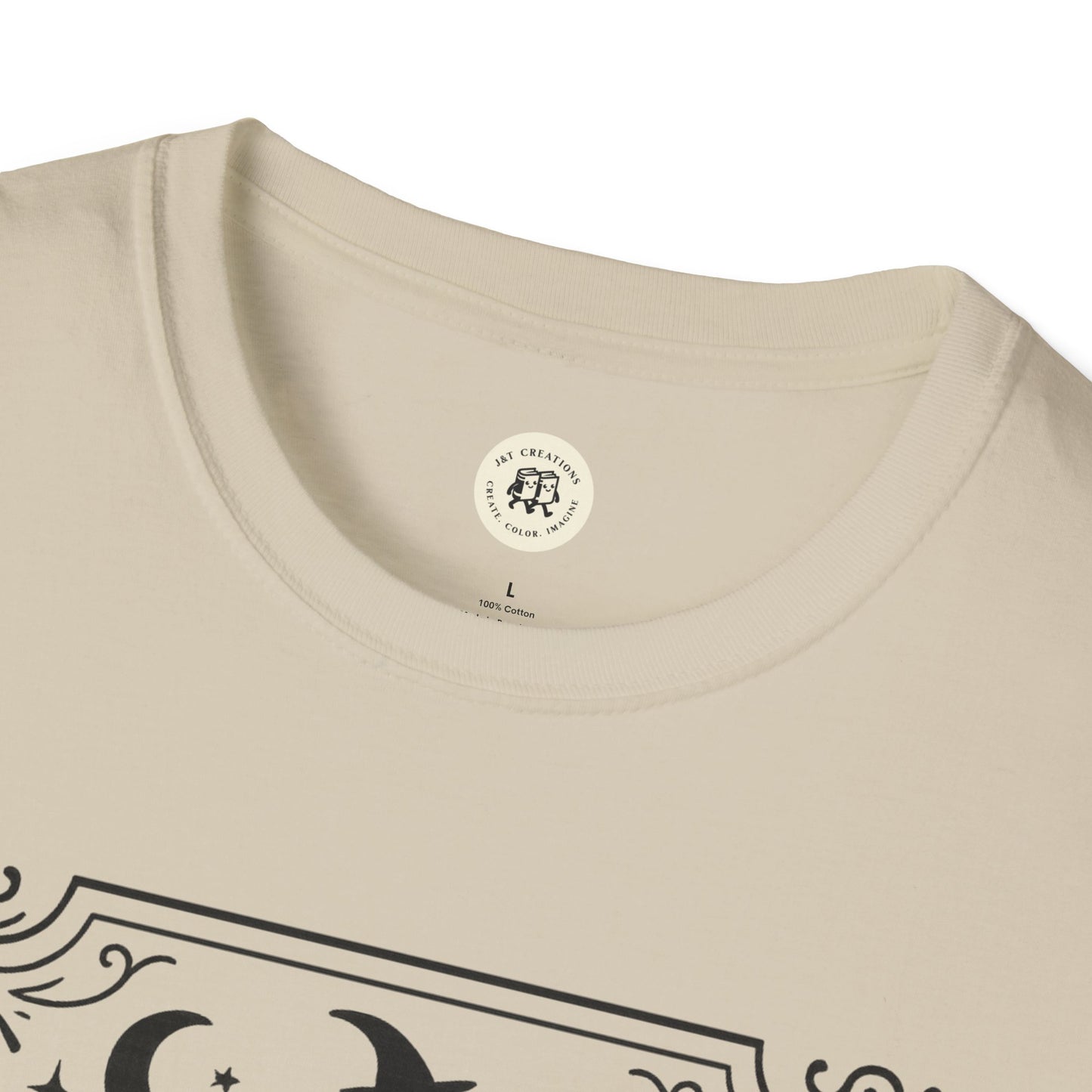 Close-up of cream Printify witchy Halloween t-shirt collar and partial graphic design