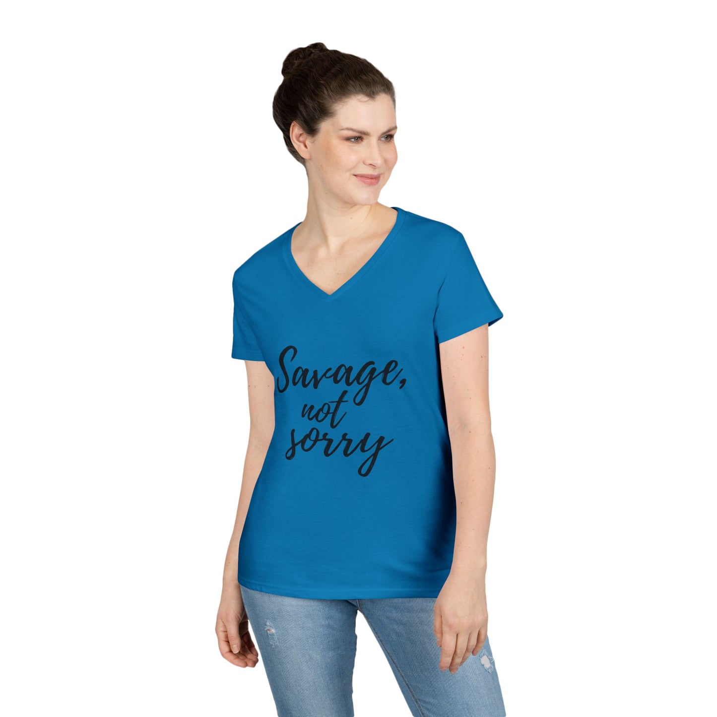 Printify blue savage v-neck t-shirt with Savage not sorry text worn by woman in casual jeans